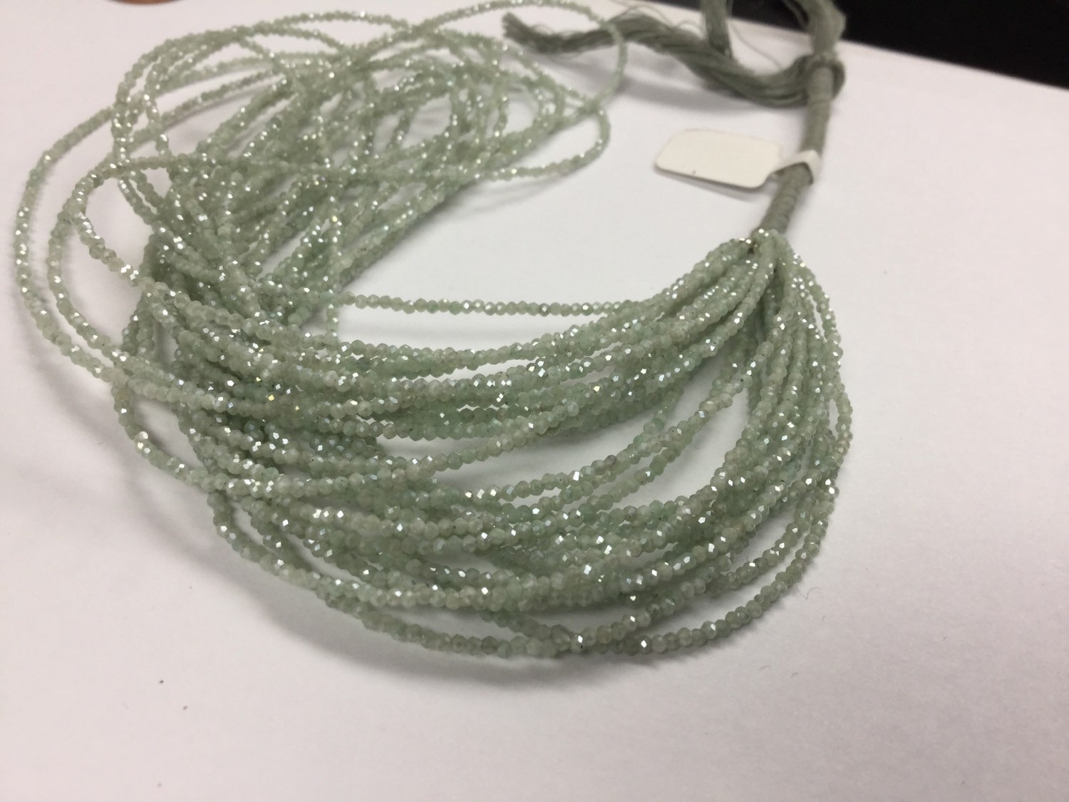 Coated Light Green Silverite/Corundum Rondelles Faceted