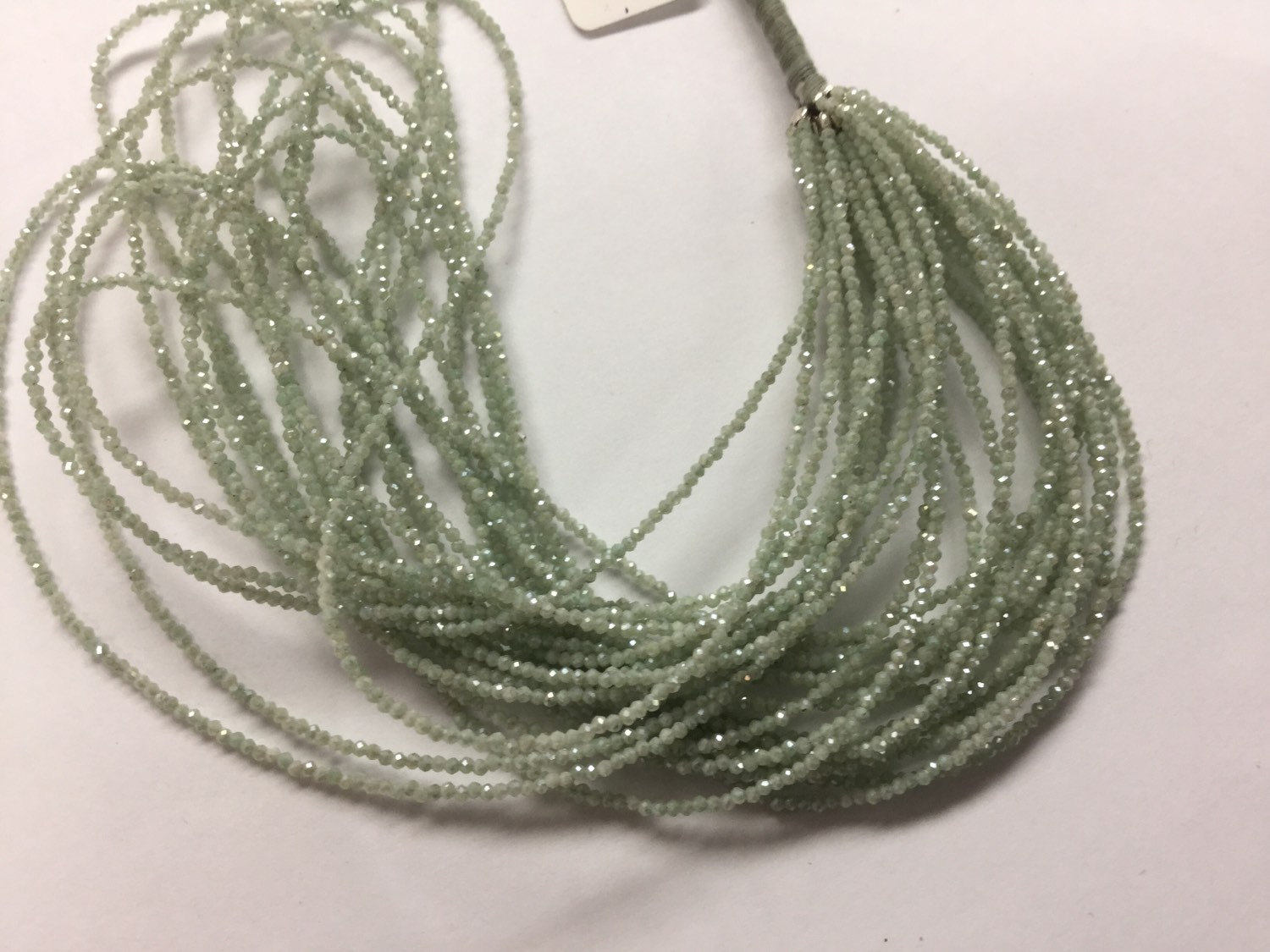 Coated Light Green Silverite/Corundum Rondelles Faceted