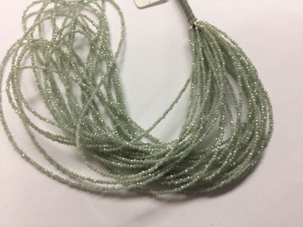 Coated Light Green Silverite/Corundum Rondelles Faceted