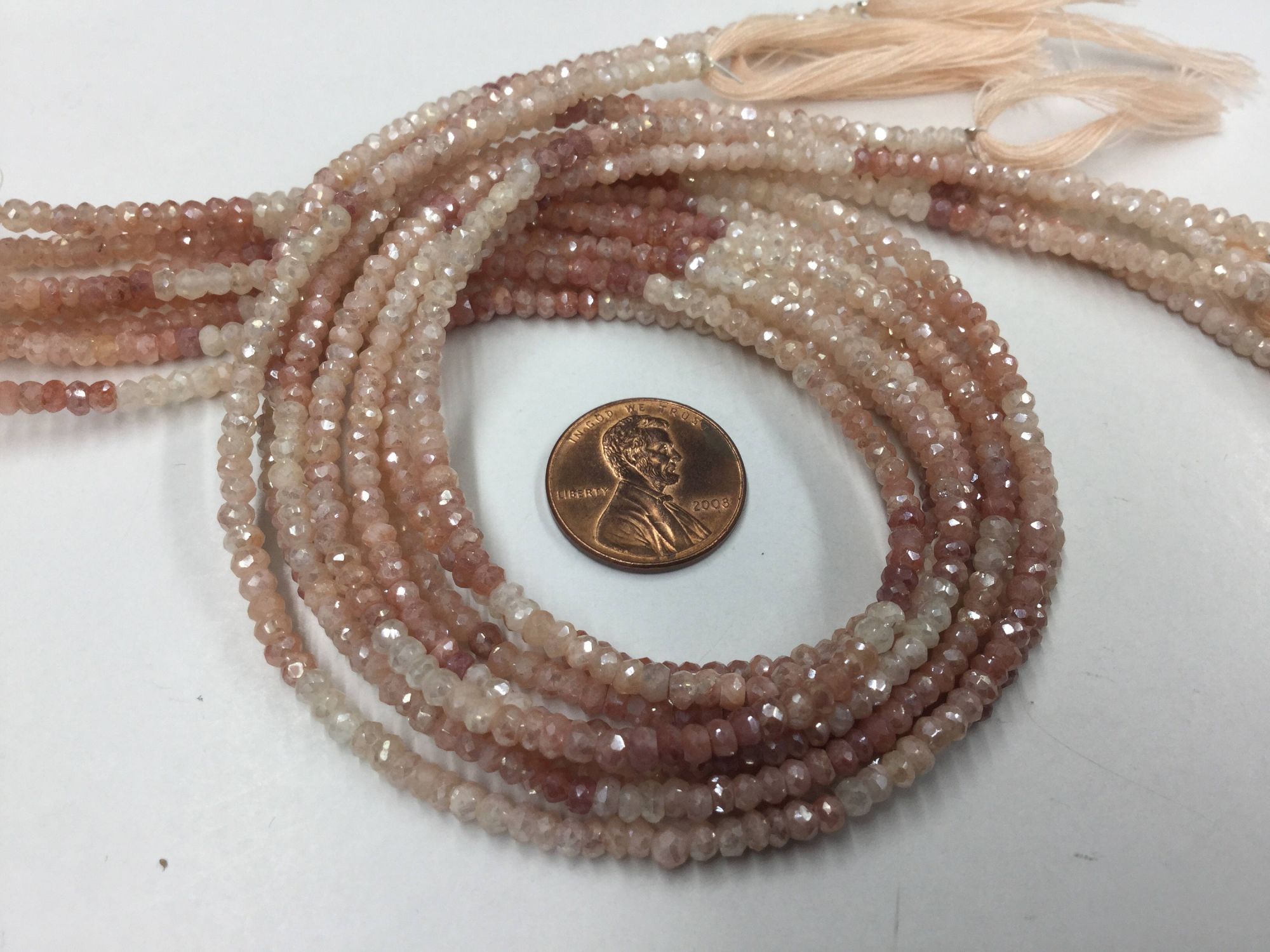 Coated Peach Moonstone Rondelles Faceted