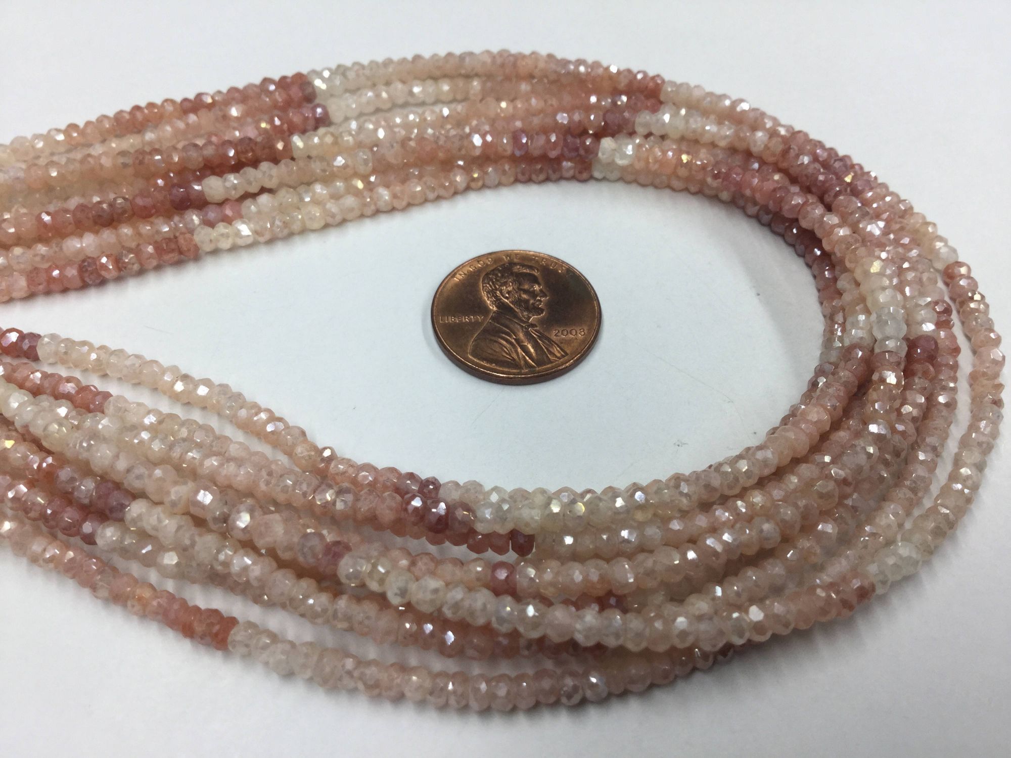 Coated Peach Moonstone Rondelles Faceted
