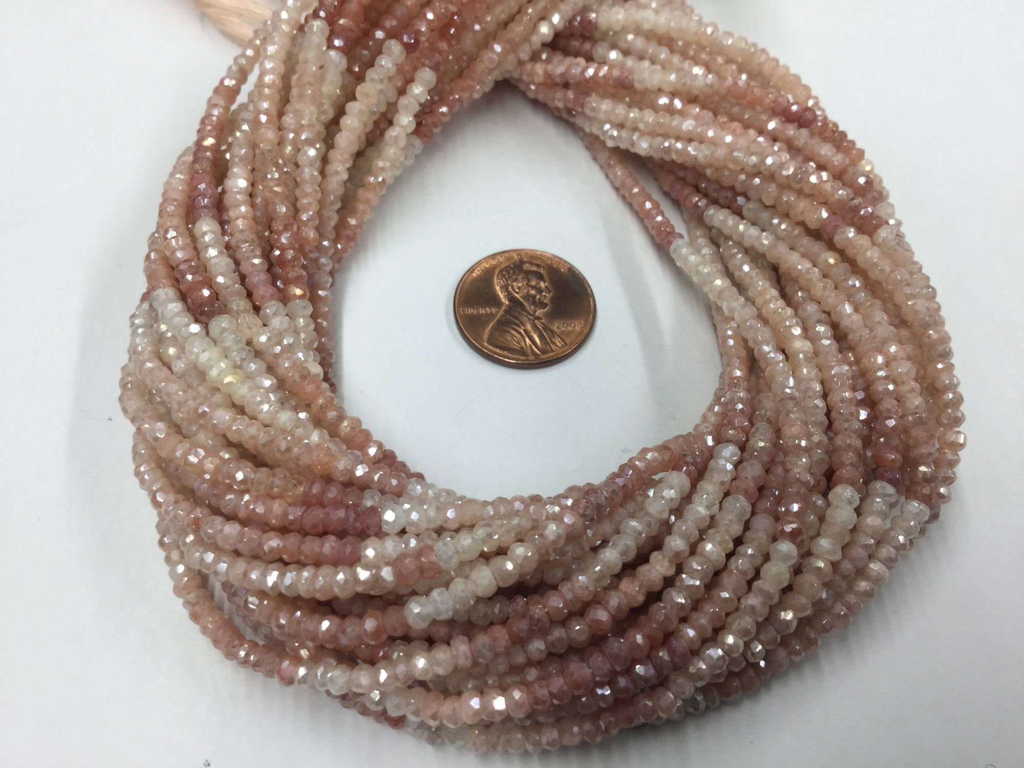Coated Peach Moonstone Rondelles Faceted