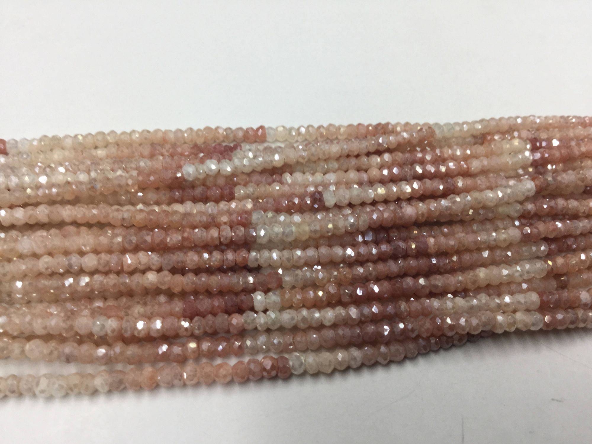 Coated Peach Moonstone Rondelles Faceted