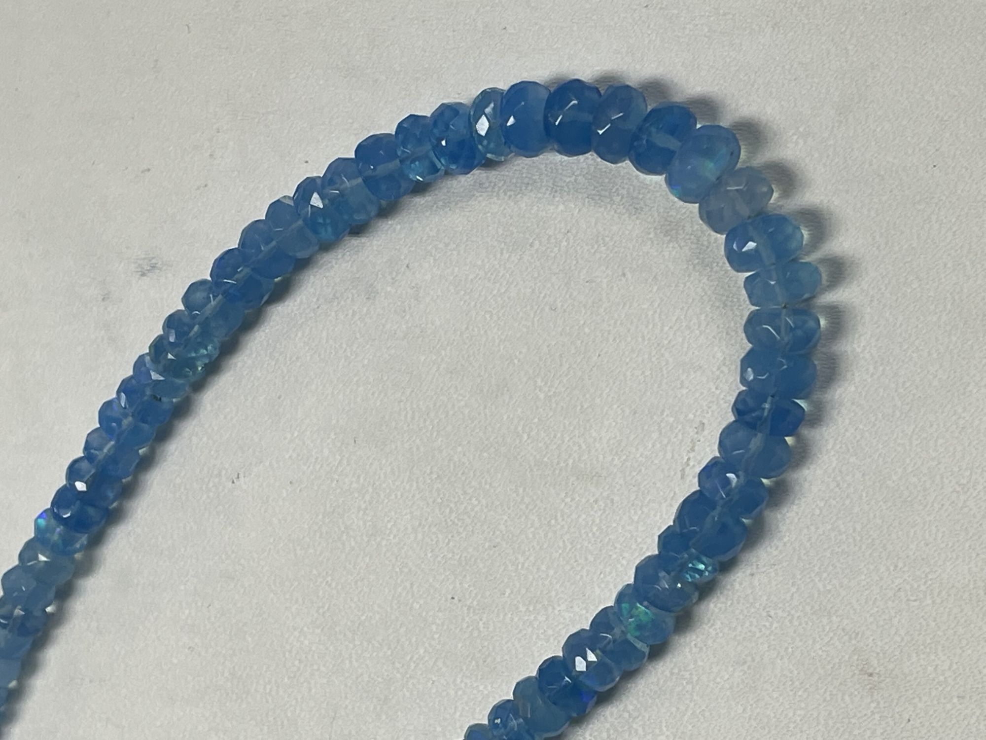 Blue Ethiopian Opal Rondelle Faceted
