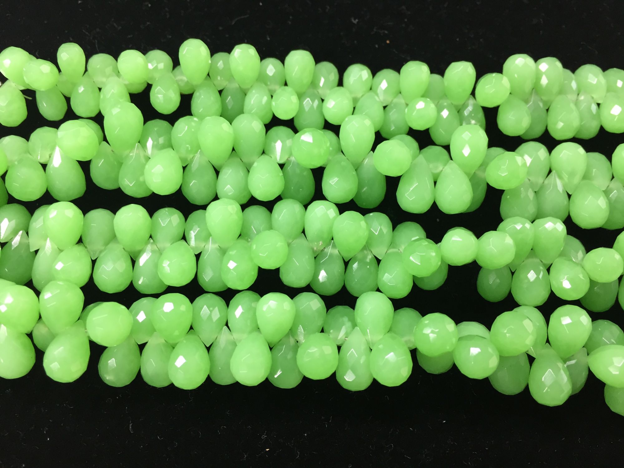 Green chalcedony drops faceted