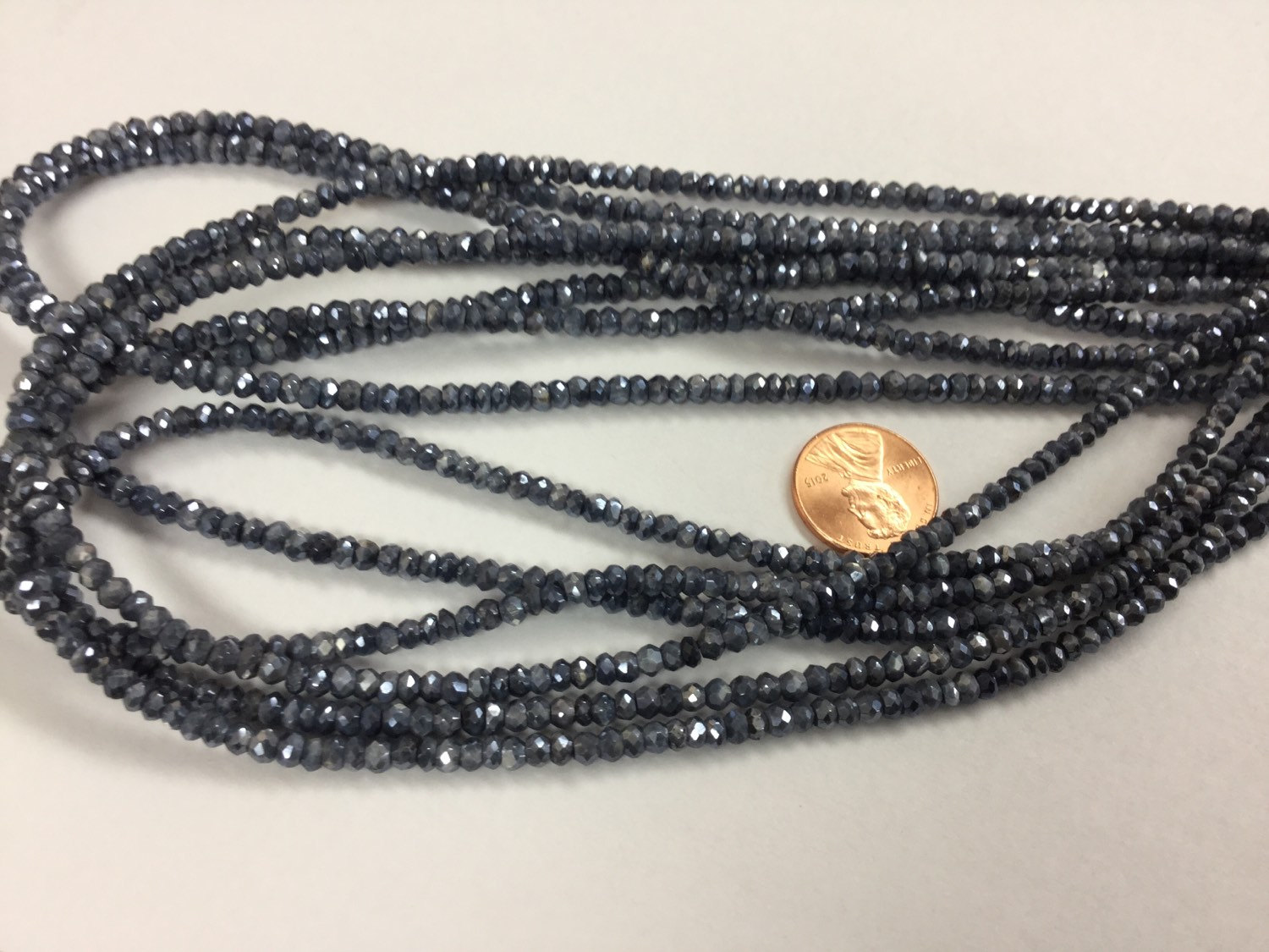 Dark Grey Corundum Rondelles Faceted