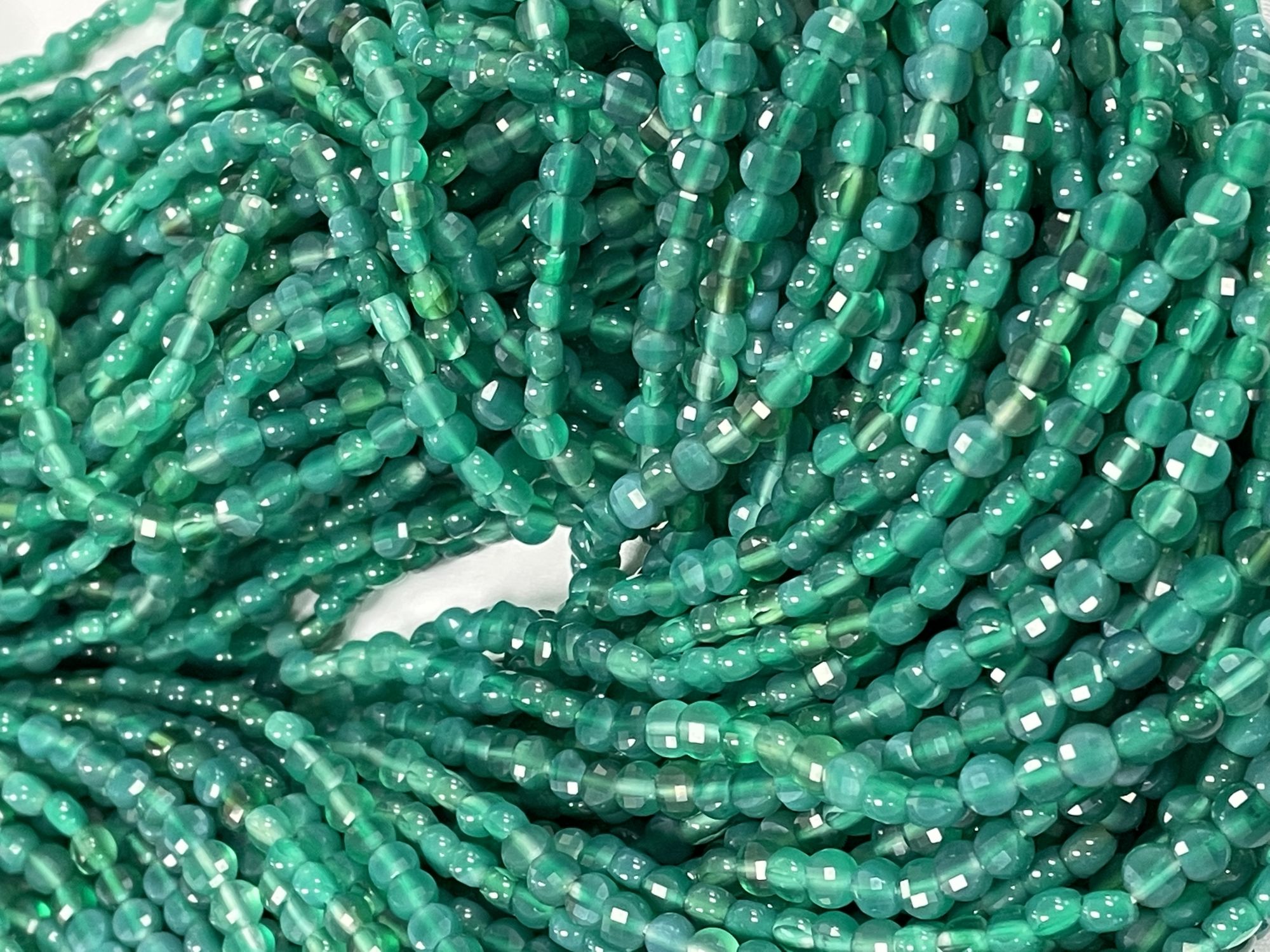 Shaded Green Onyx Coin Faceted