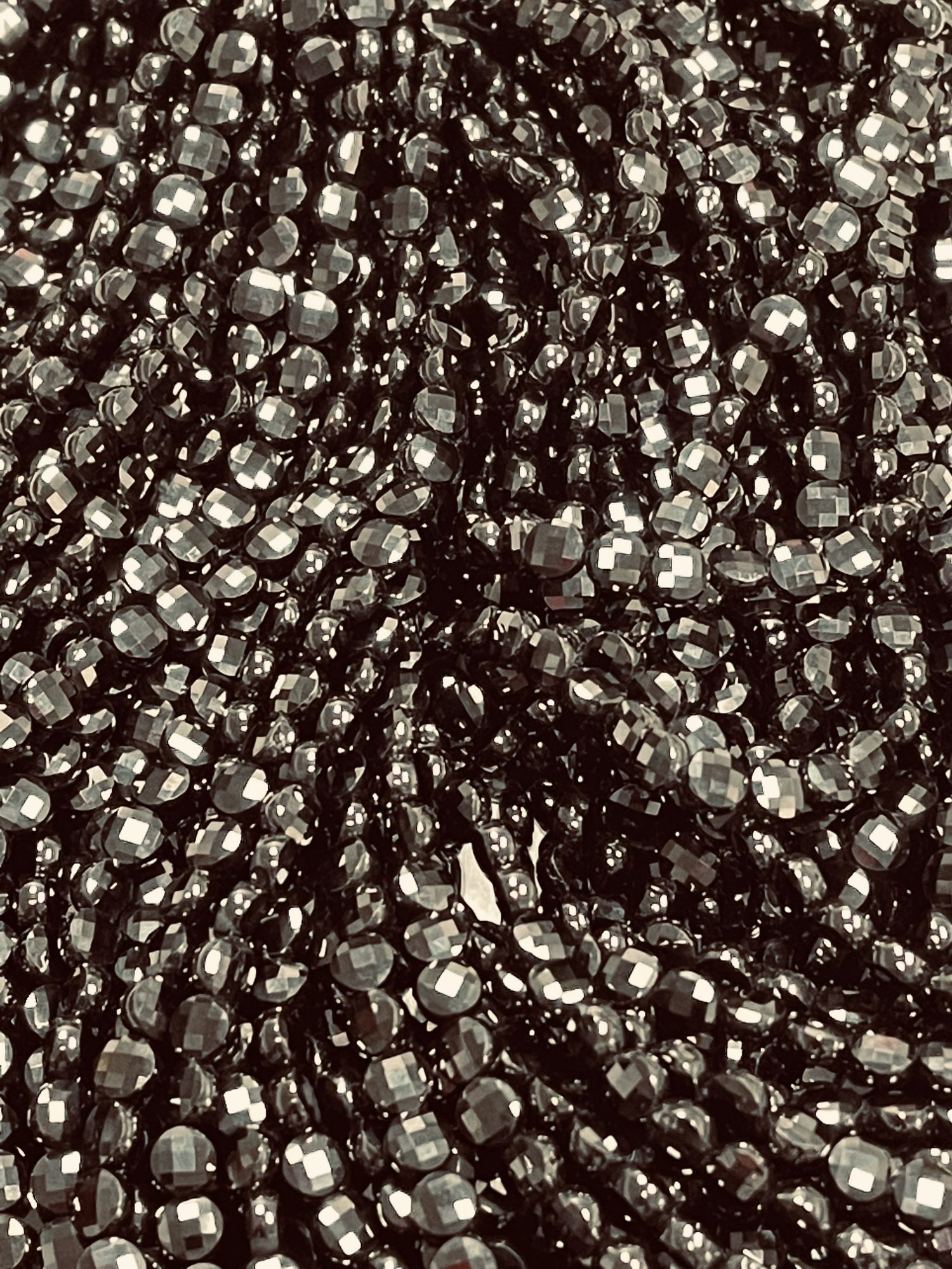 Black Spinel Coin Faceted