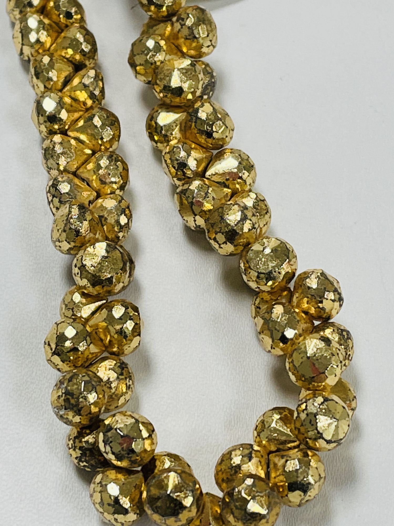 Gold Coated Pyrite Onions Faceted