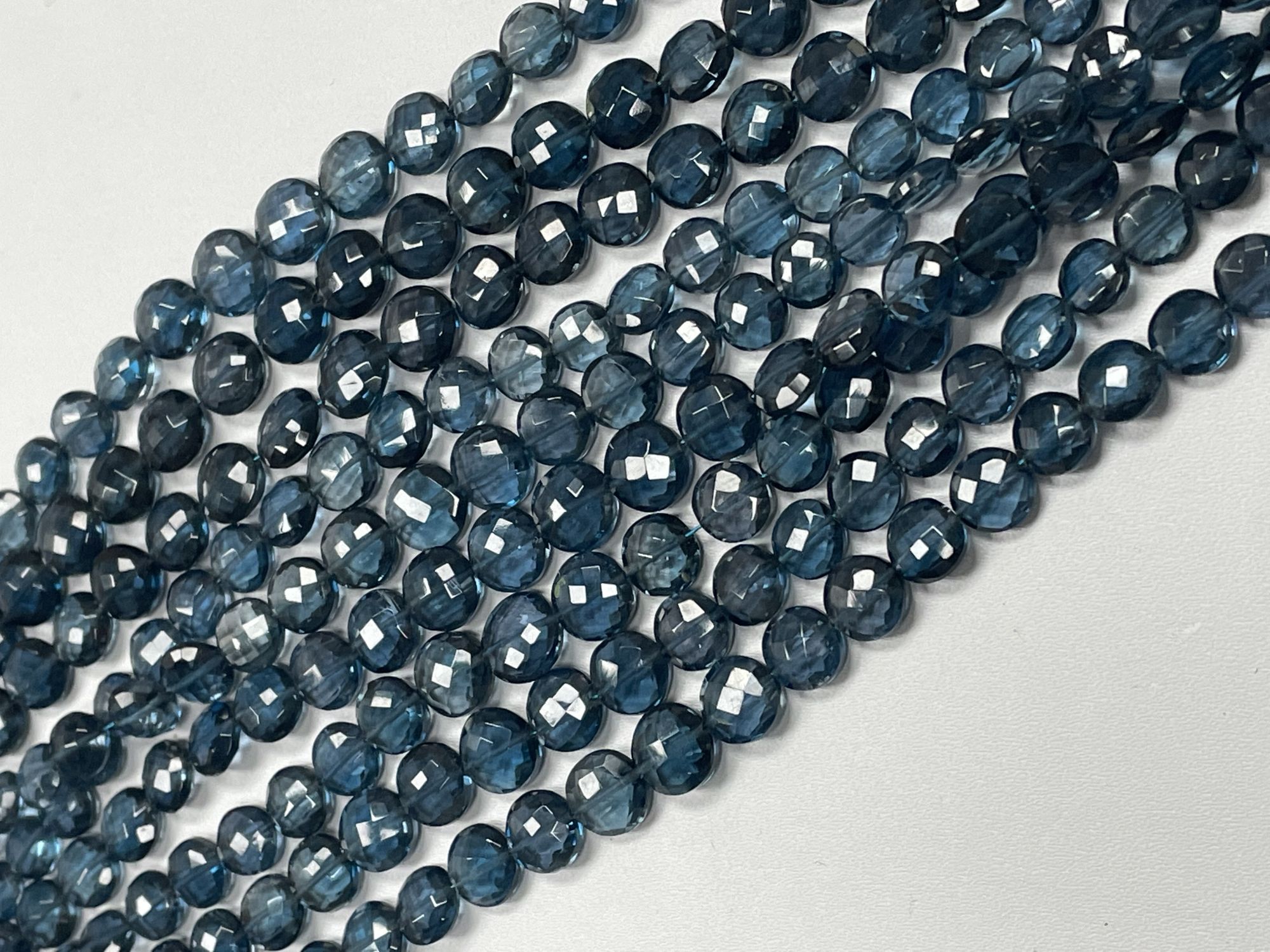 London Blue Topaz Coin Faceted