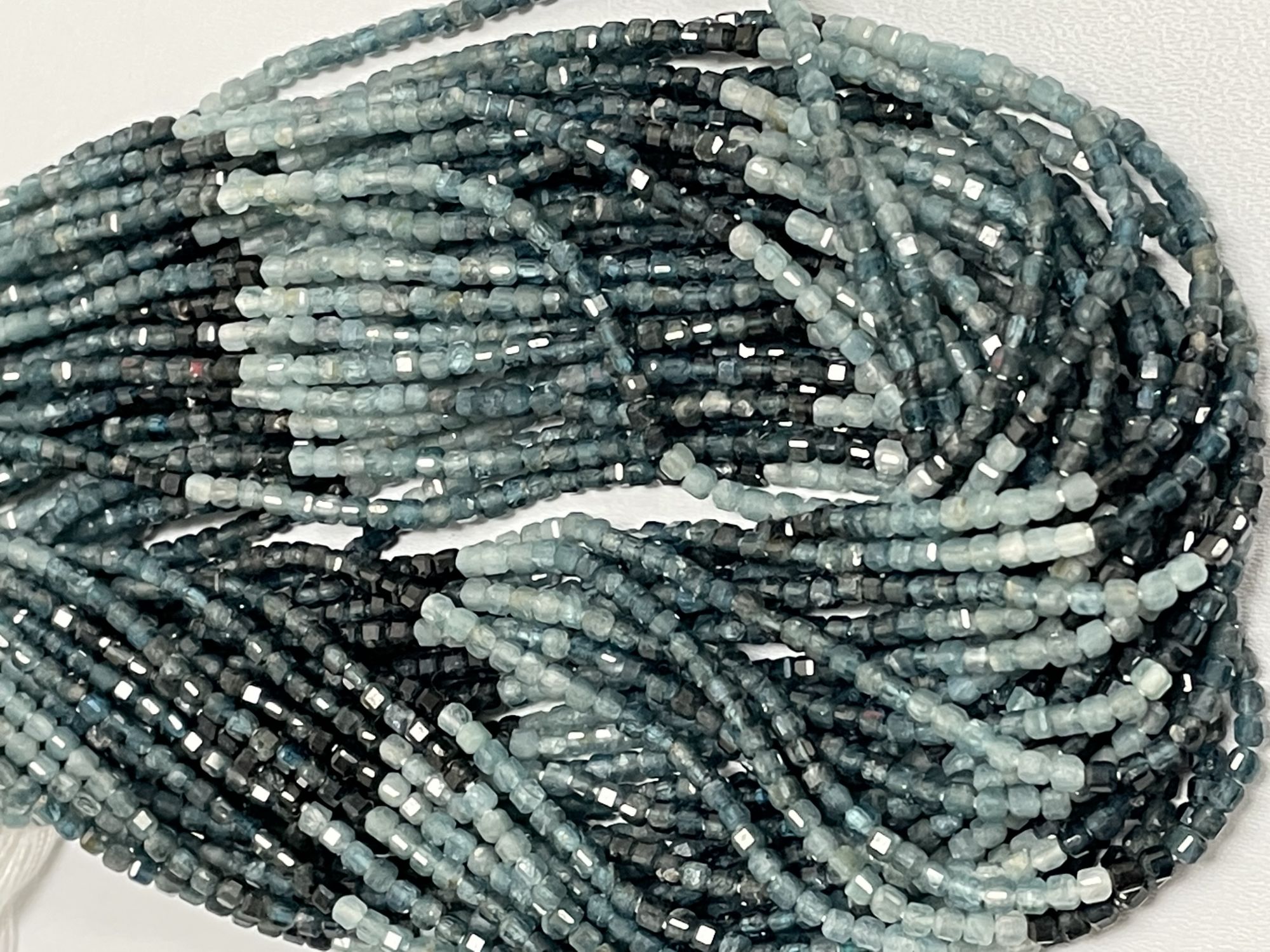 Shaded Grandidierite Rondelle Faceted