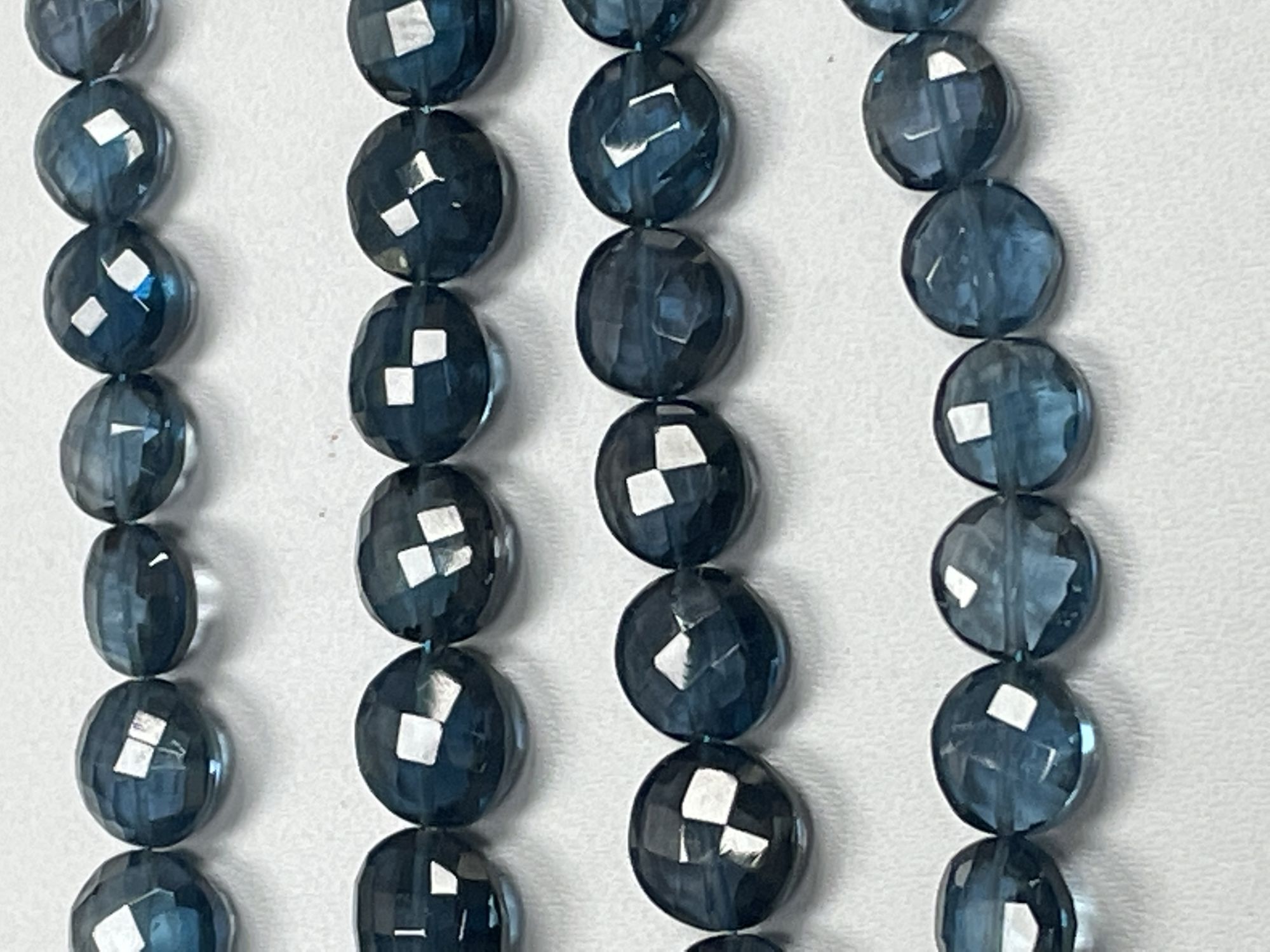 London Blue Topaz Coin Faceted