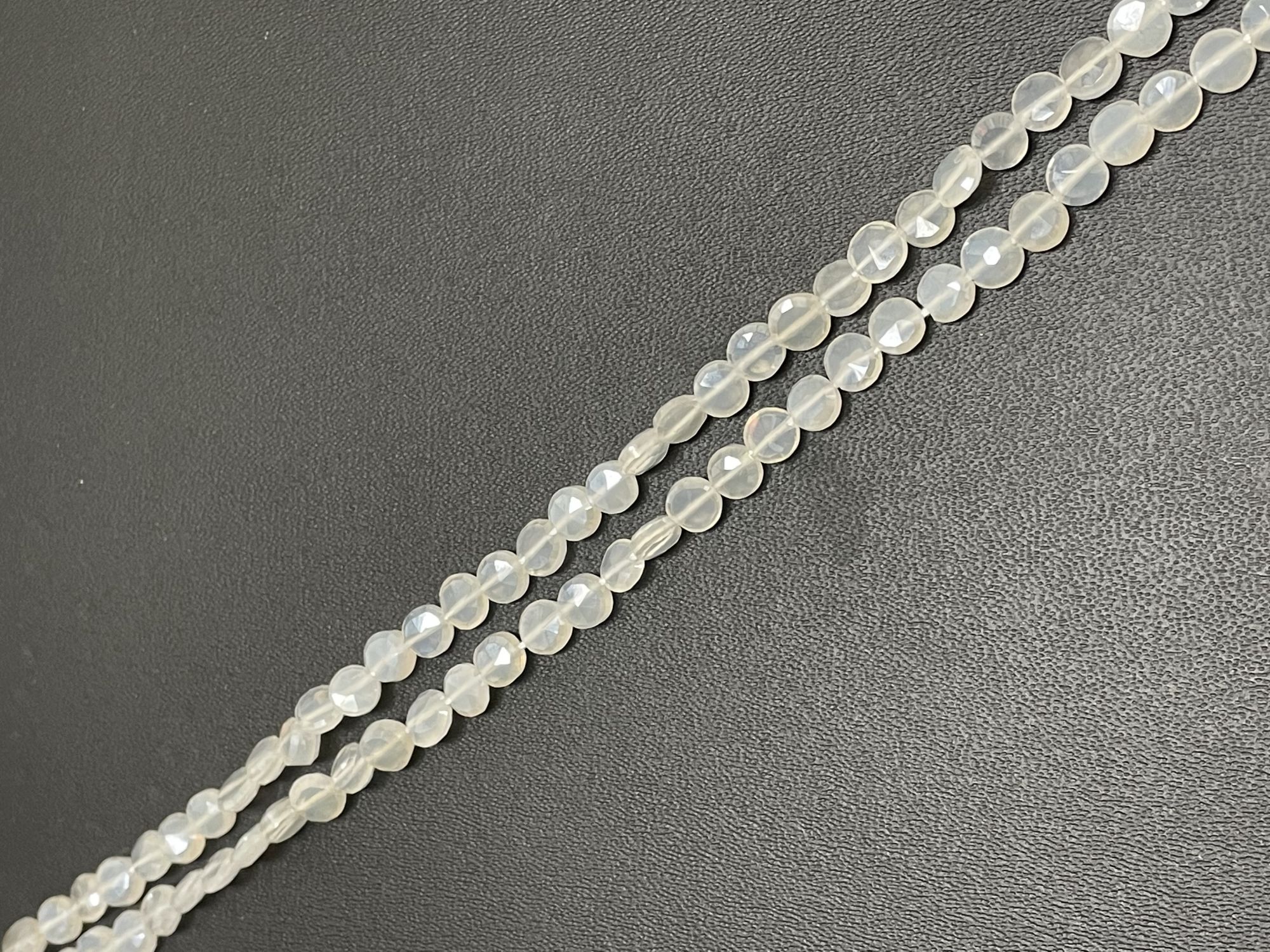 Coated Quartz Coin Faceted