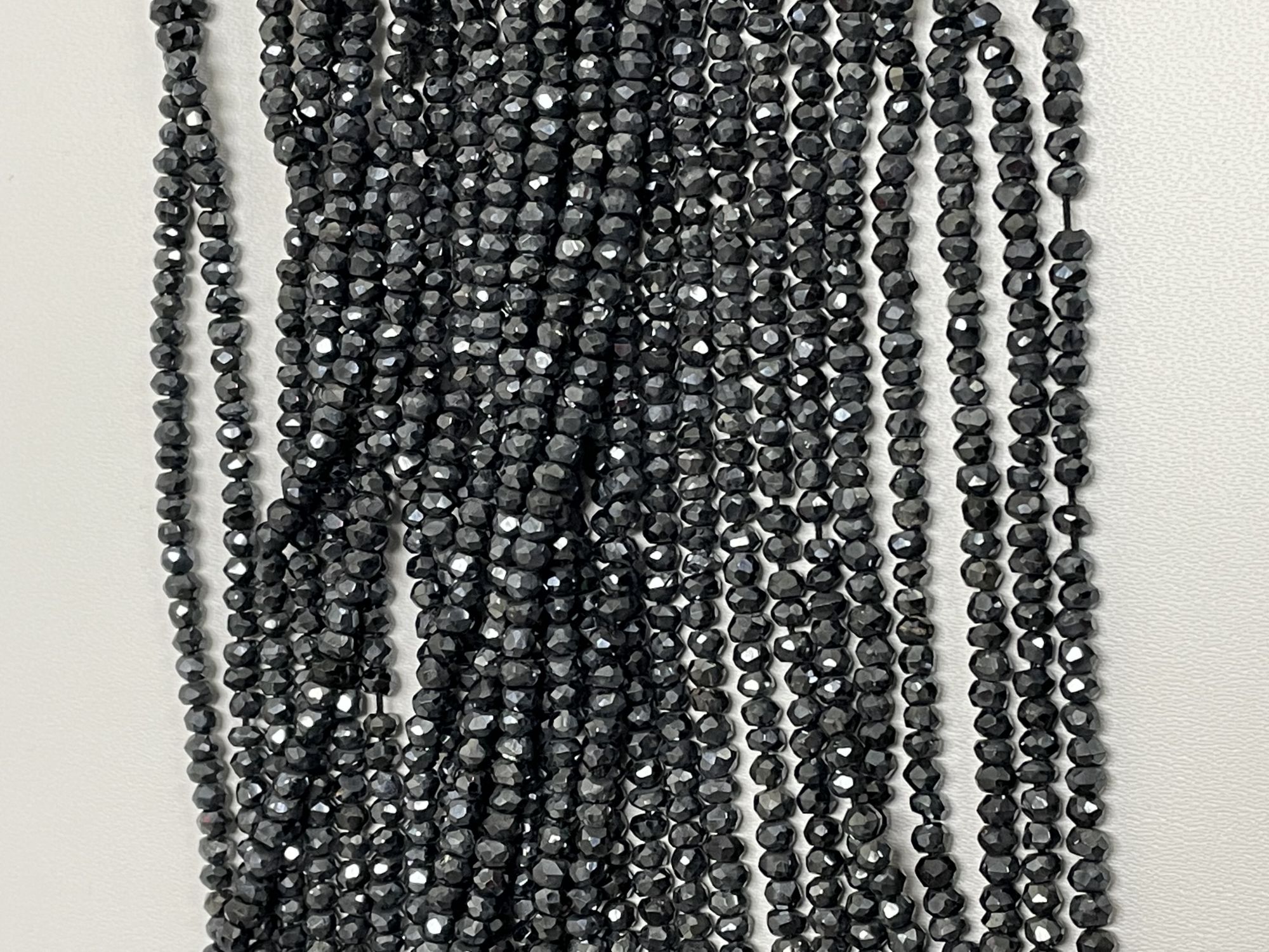 Coated Black Spinel Rondelle Faceted