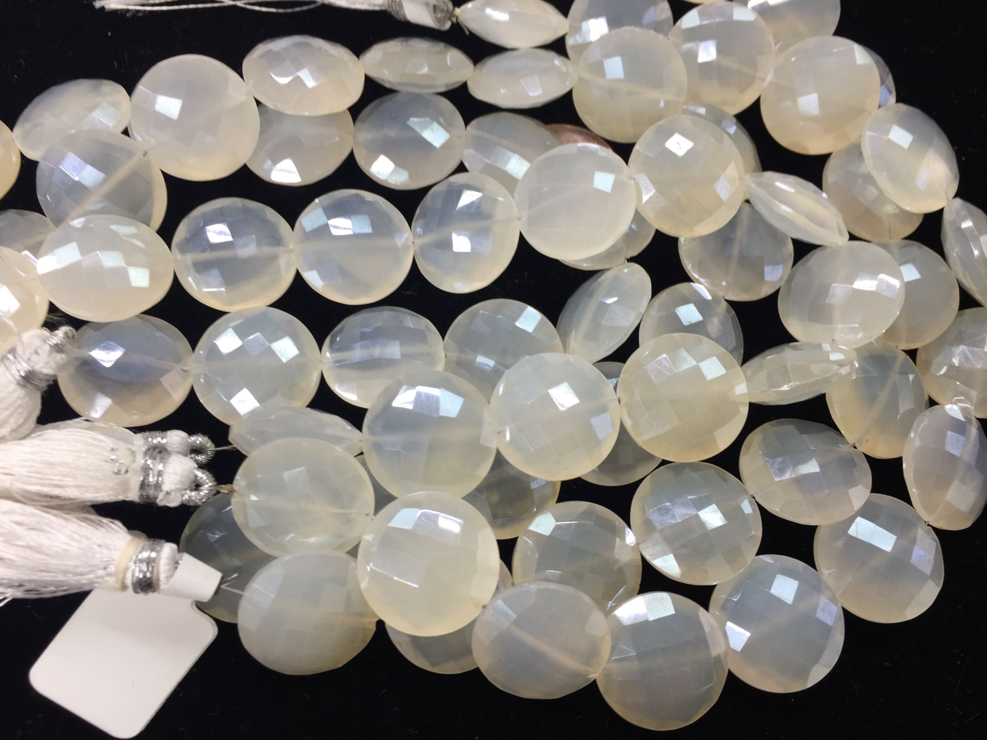 White chalcedony coins faceted