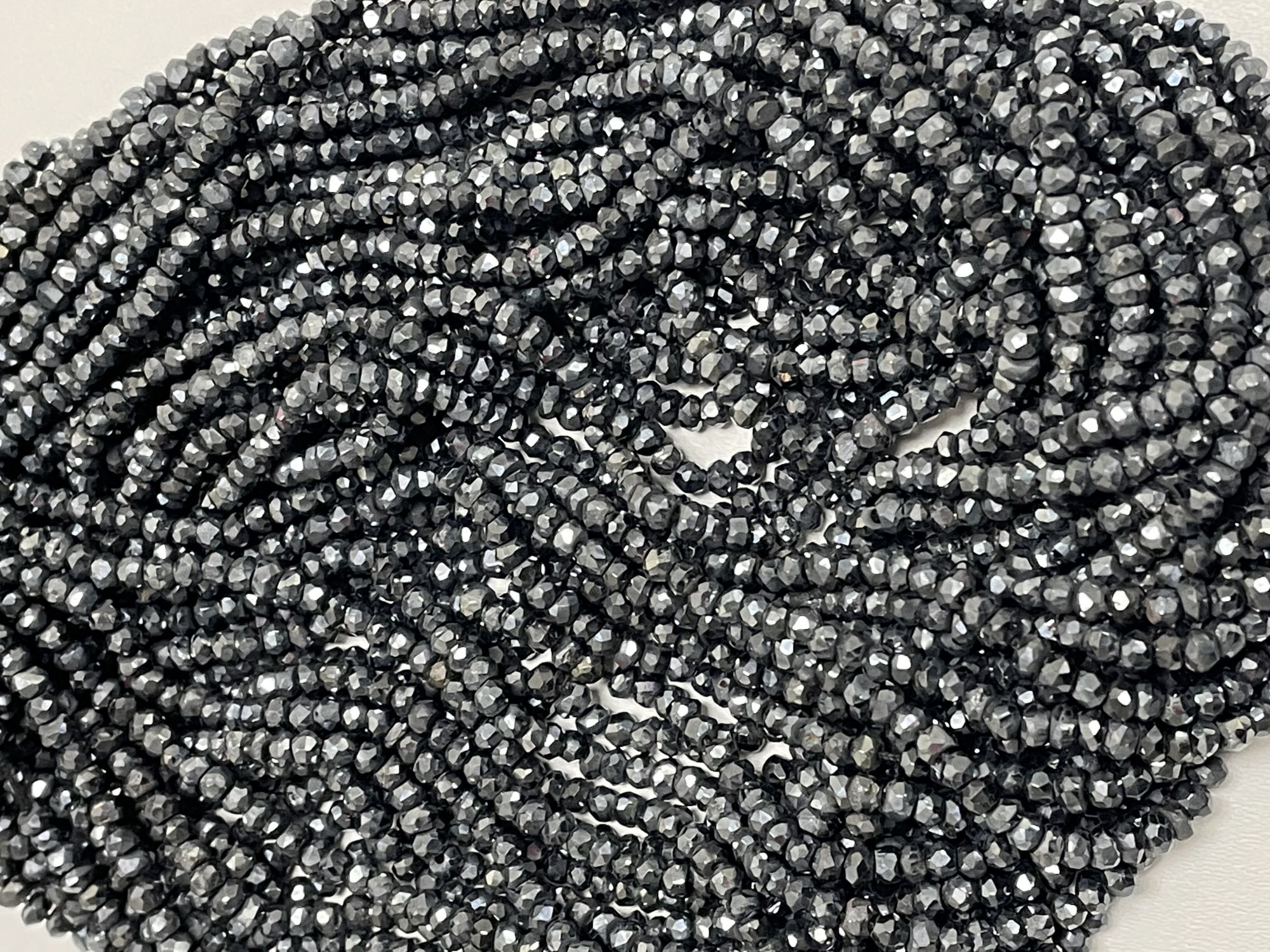 Coated Black Spinel Rondelle Faceted