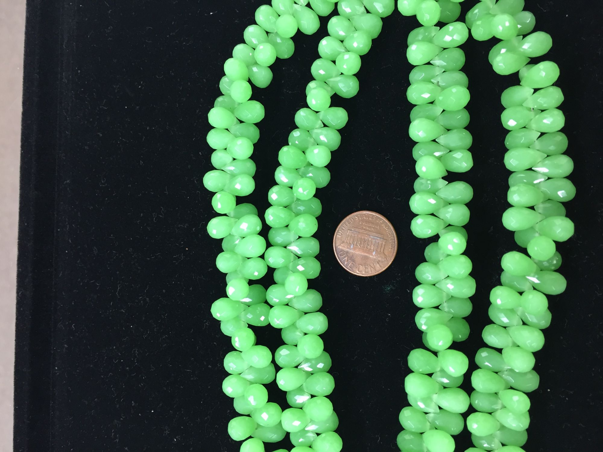 Green chalcedony drops faceted