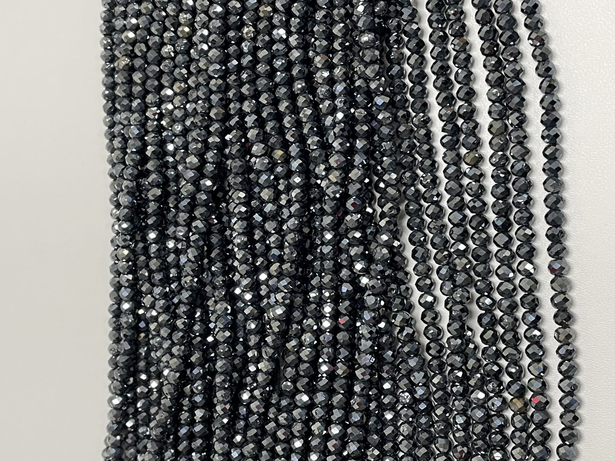 Coated Black Spinel Rondelle Faceted