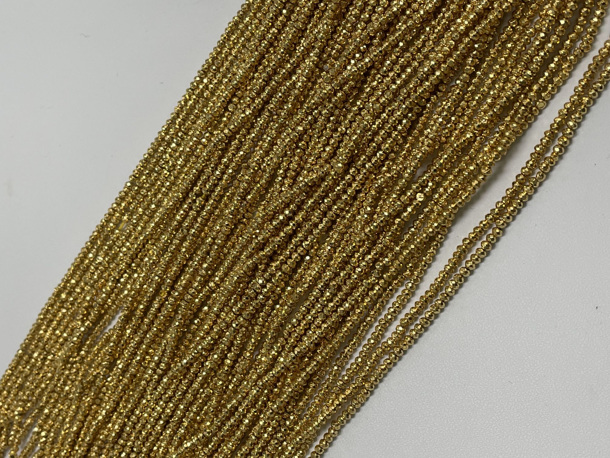 Coated Pyrite Rondelle Faceted