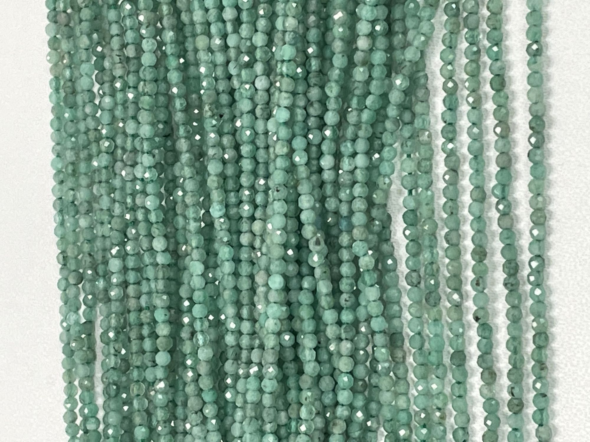 Emerald Rondelle Faceted