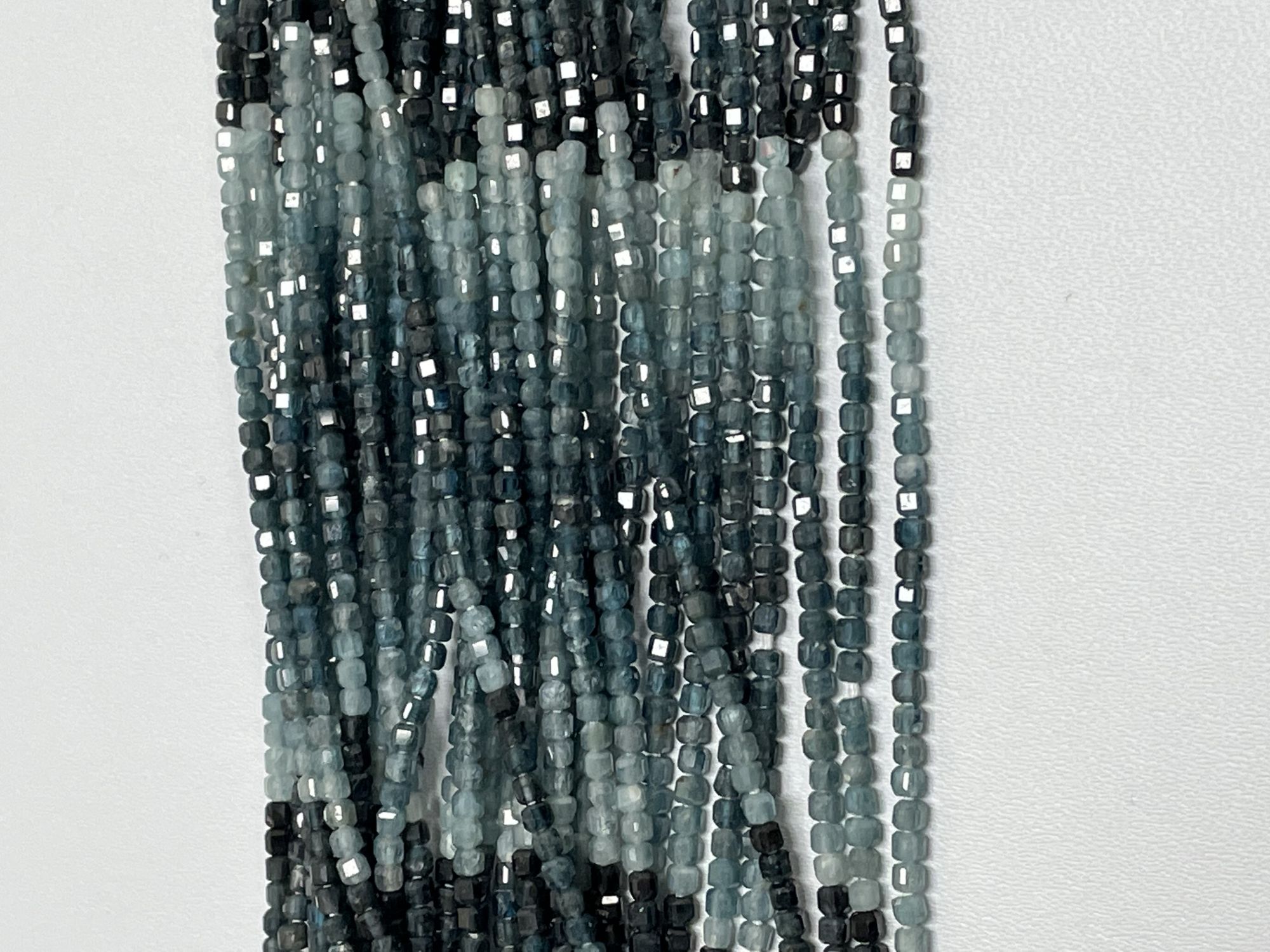 Shaded Grandidierite Rondelle Faceted