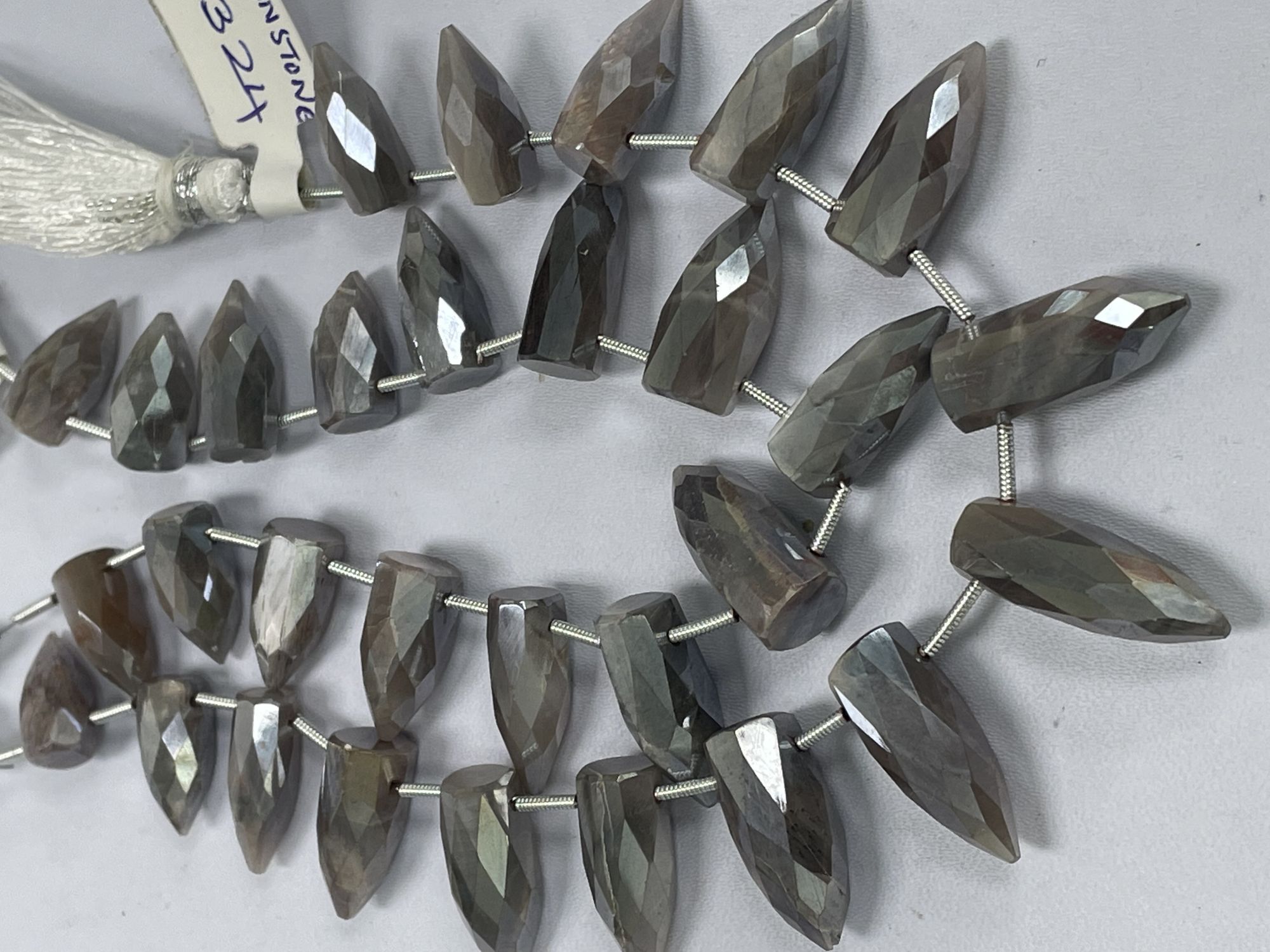 Coated Moonstone Bullet Faceted