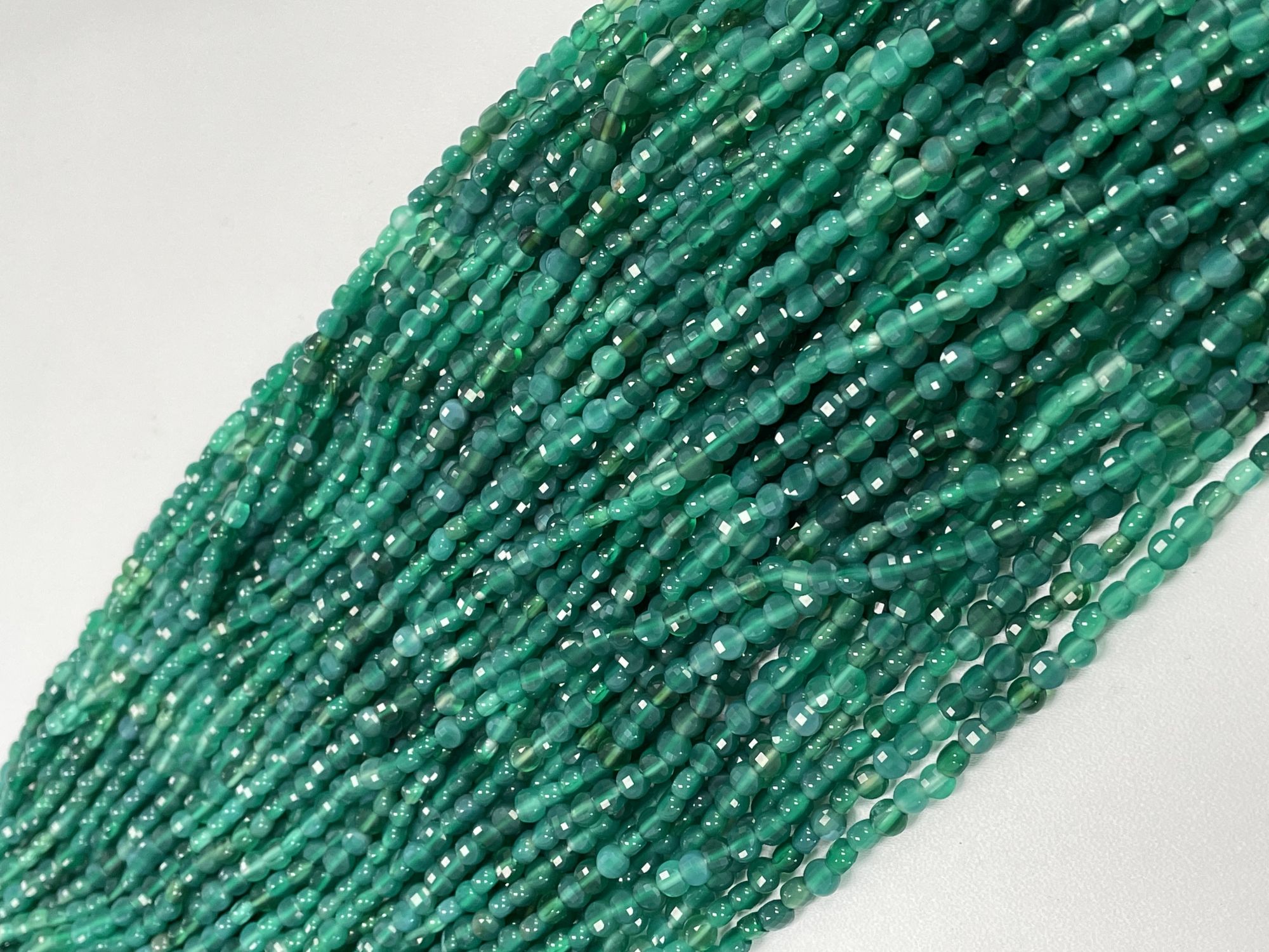 Shaded Green Onyx Coin Faceted