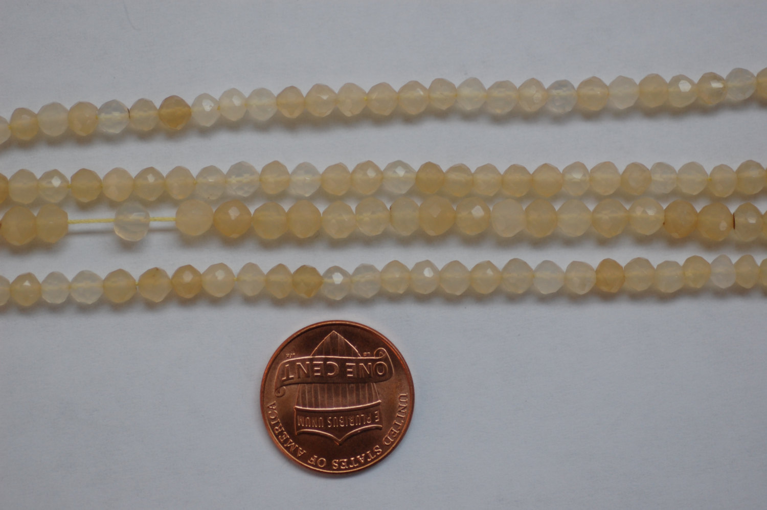 Golden Shaded Chalcedony Rounds Faceted