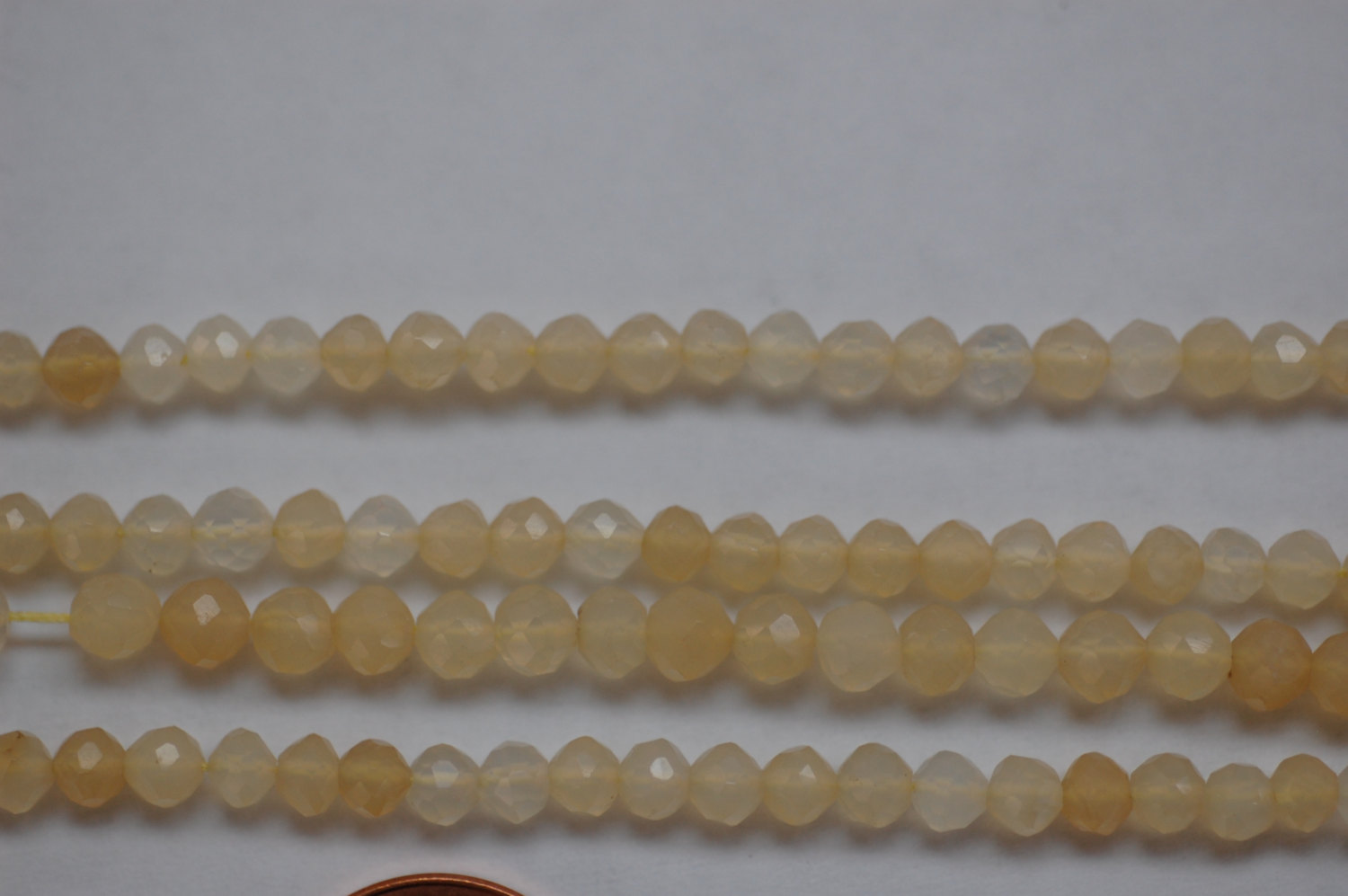 Golden Shaded Chalcedony Rounds Faceted