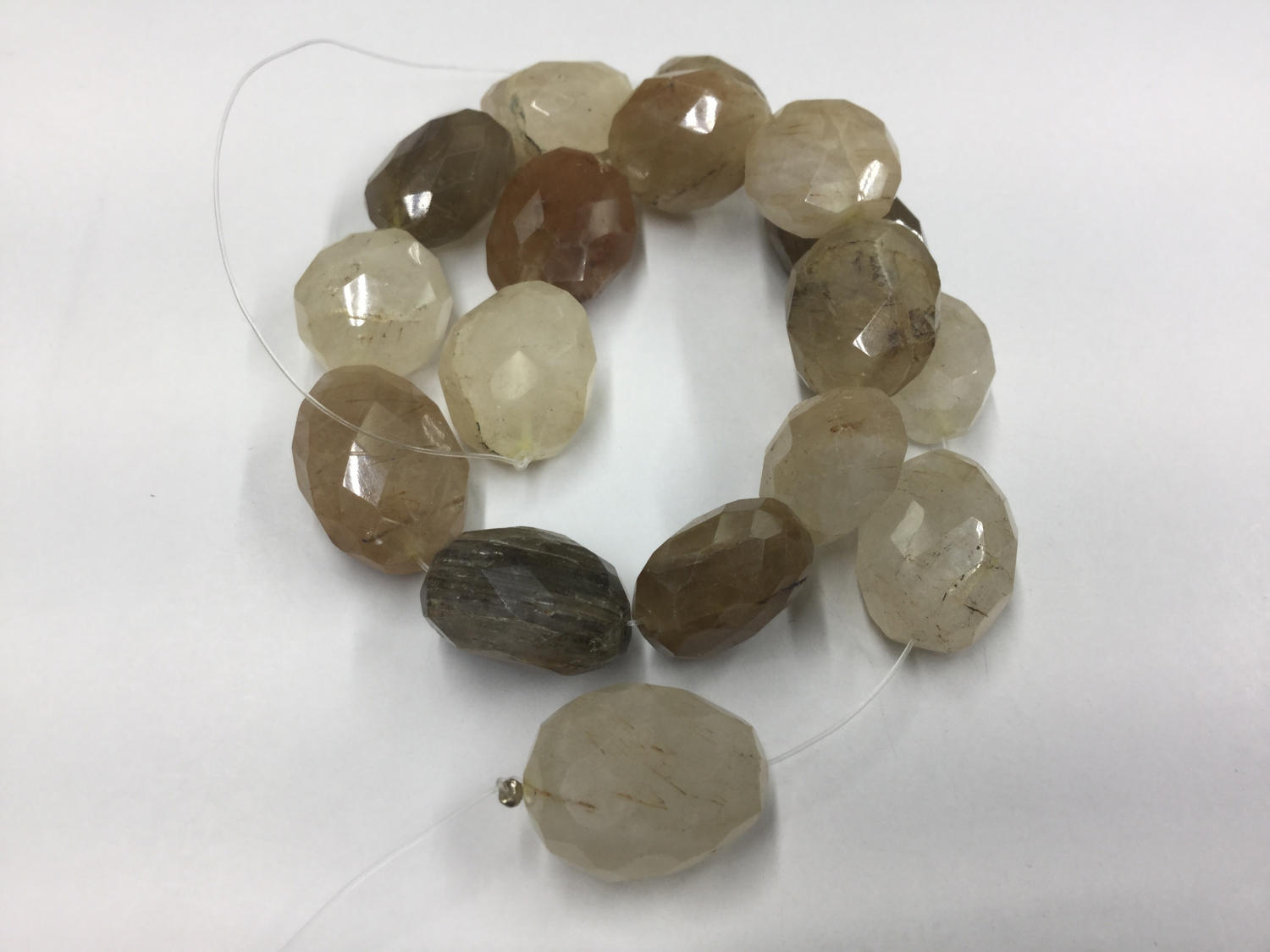 Golden Rutilated Quartz Ovals Faceted