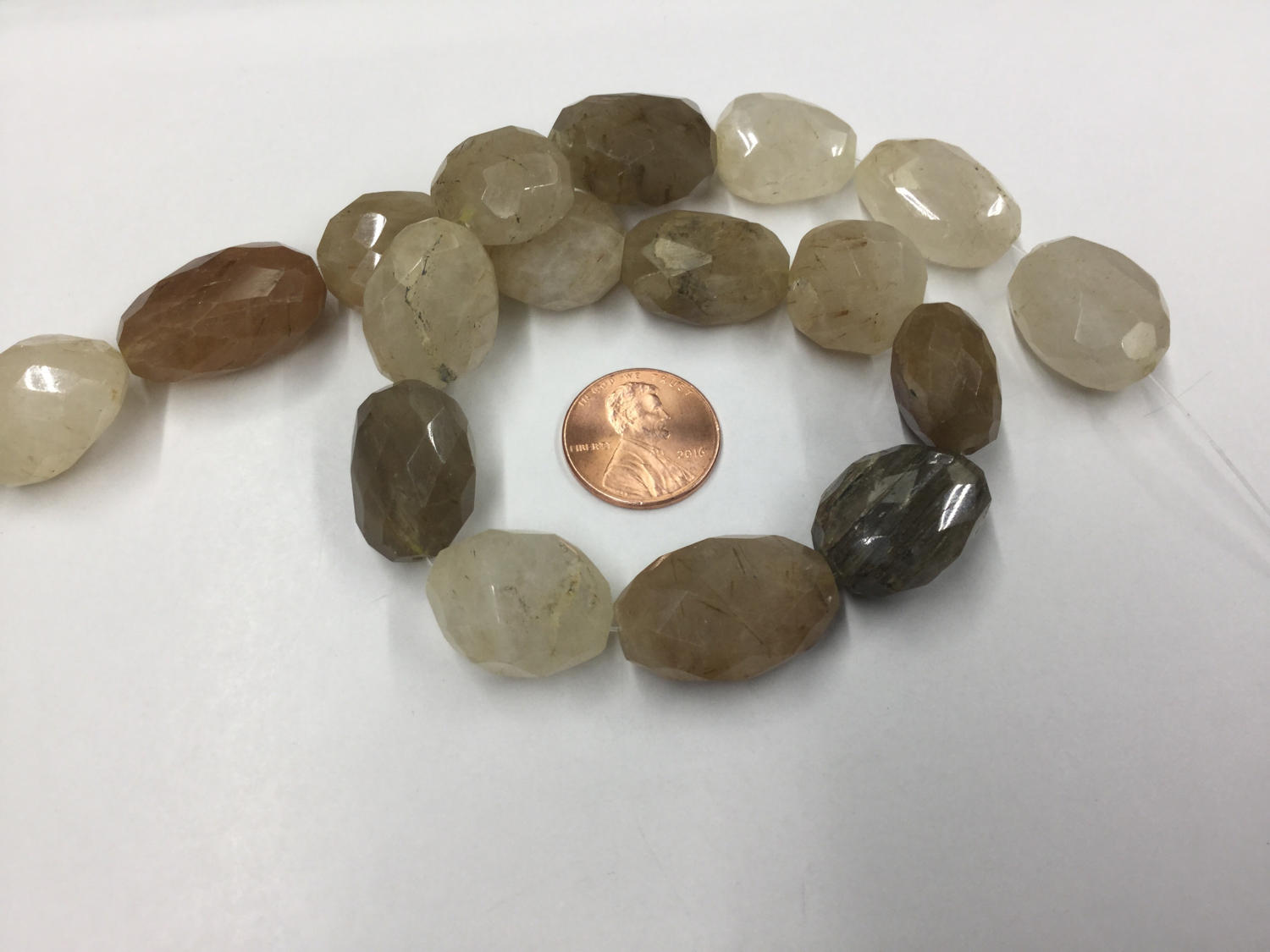 Golden Rutilated Quartz Ovals Faceted
