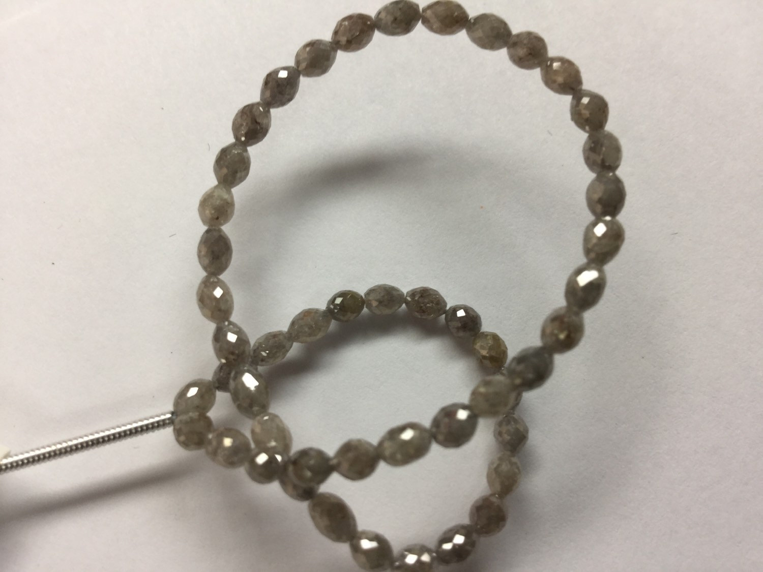 Grayish Brown Diamonds Rounded Ovals Faceted