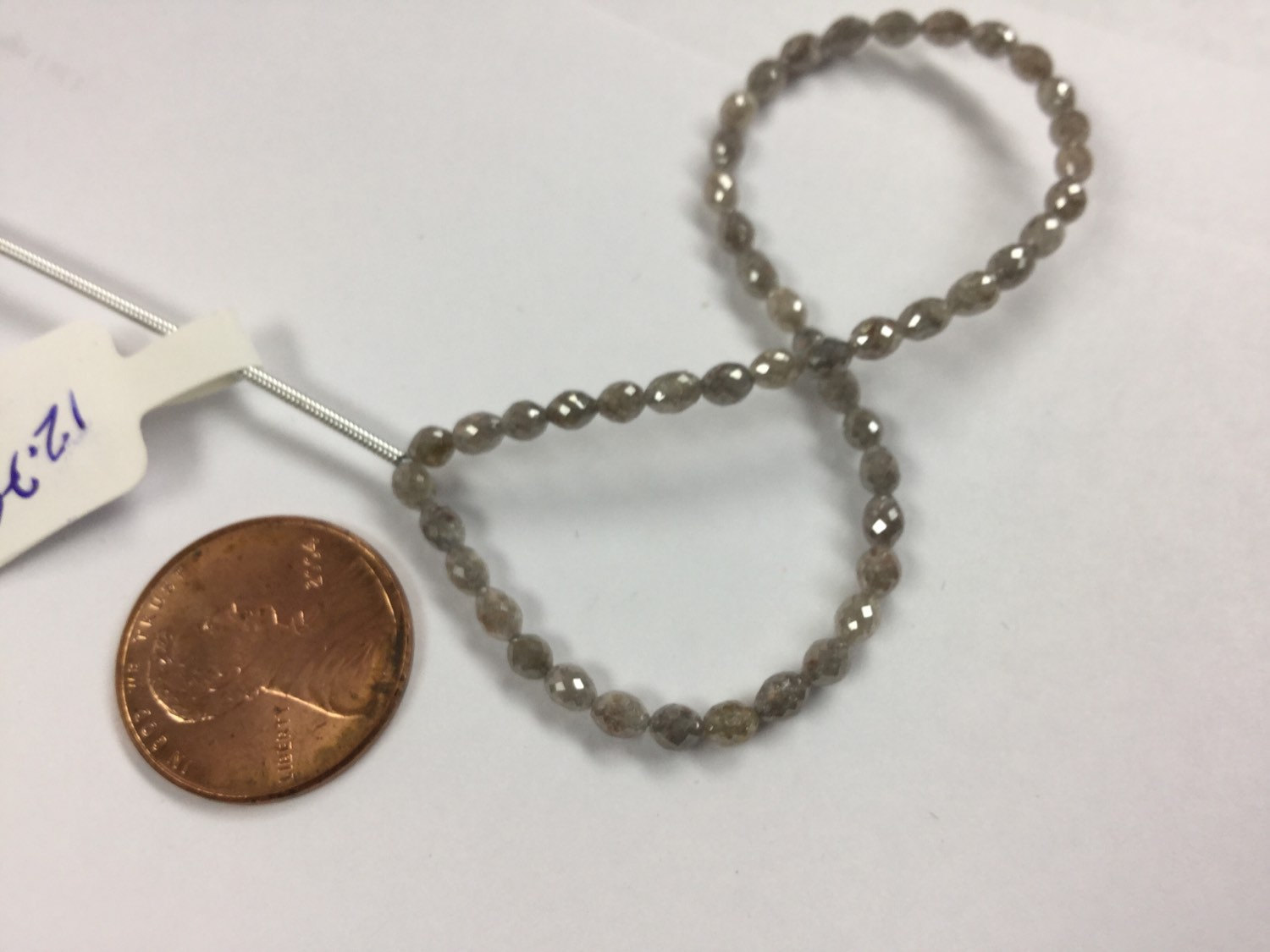 Grayish Brown Diamonds Rounded Ovals Faceted