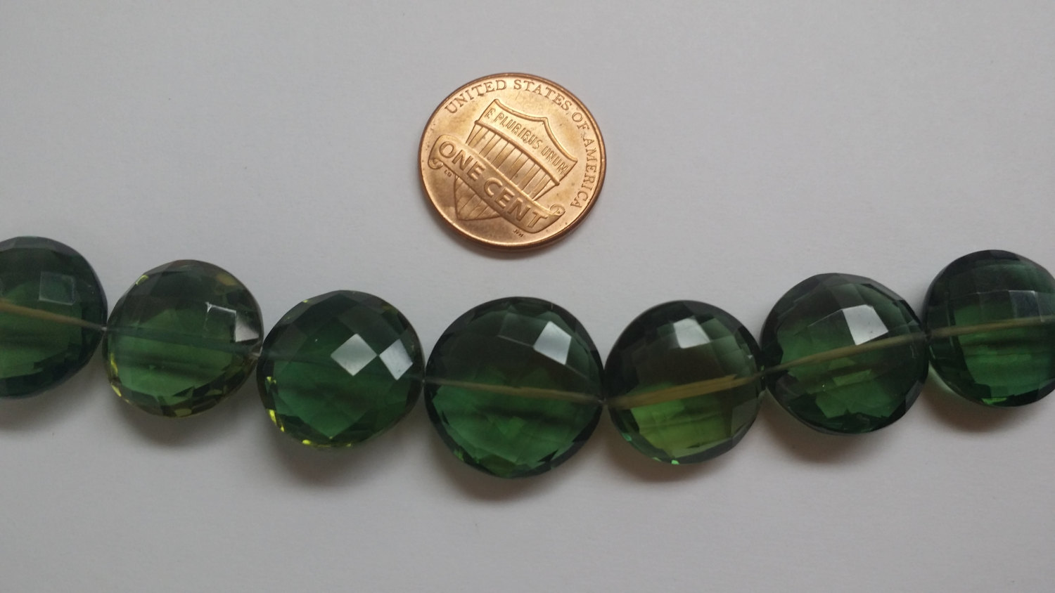 Green Coins Faceted