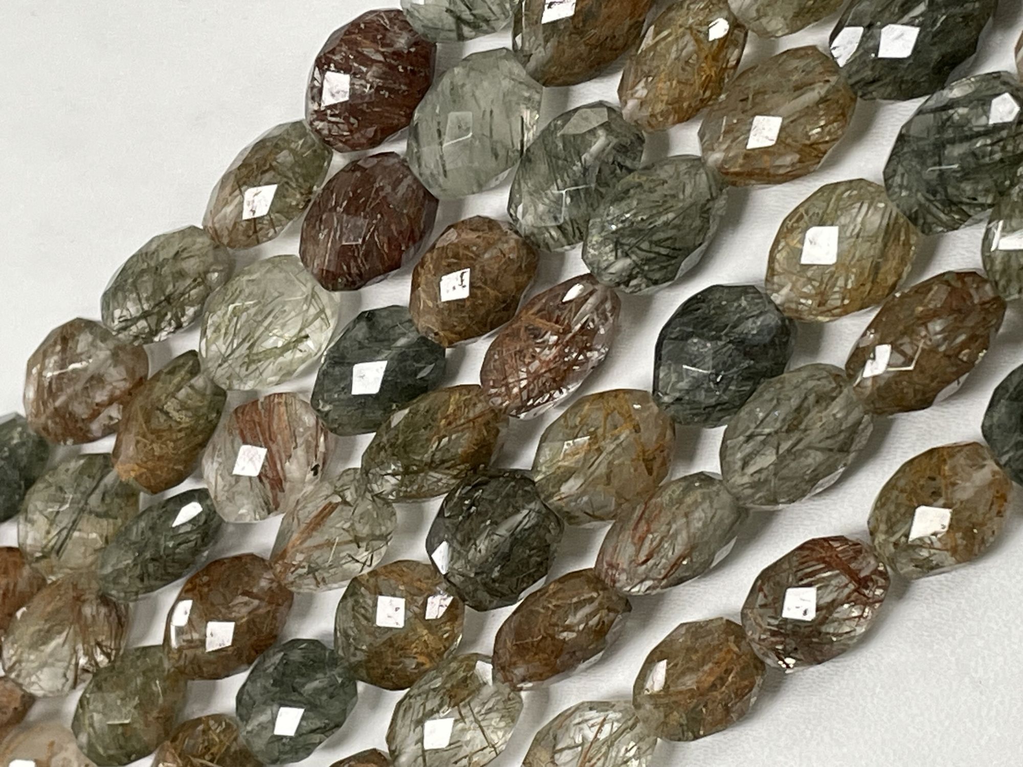 Multi Rutilated Quartz Oval Faceted