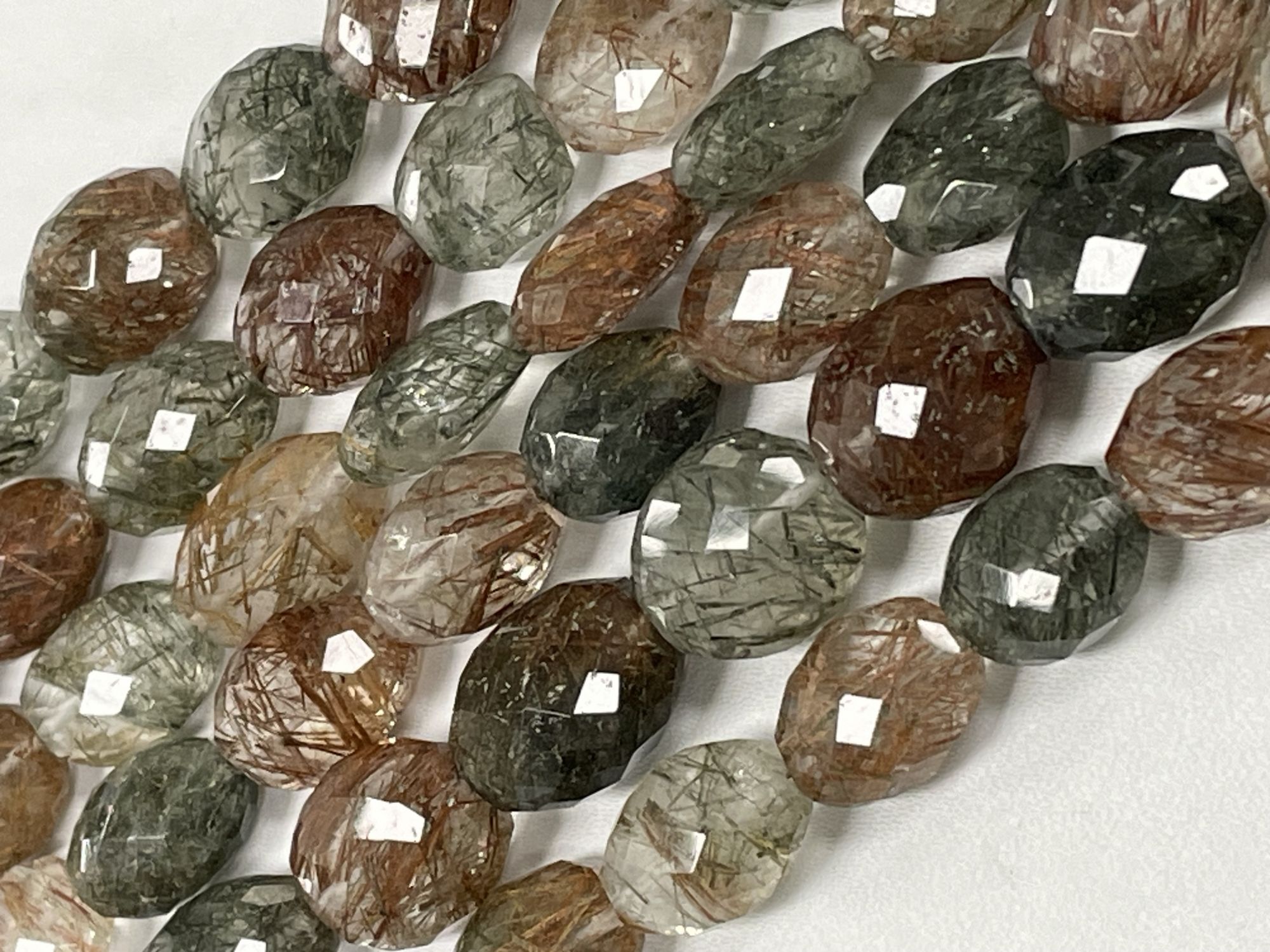 Multi Rutilated Quartz Oval Faceted