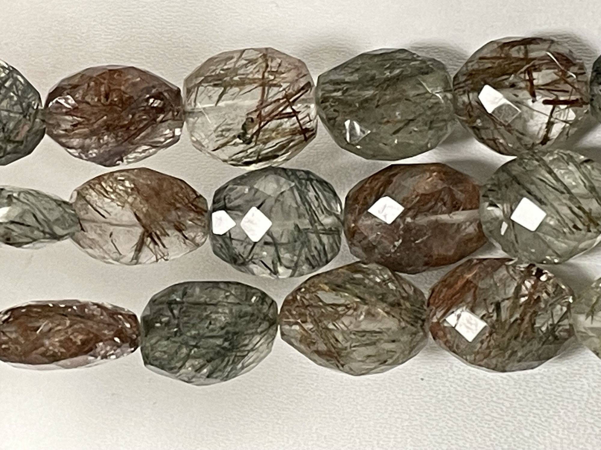 Multi Rutilated Quartz Oval Faceted
