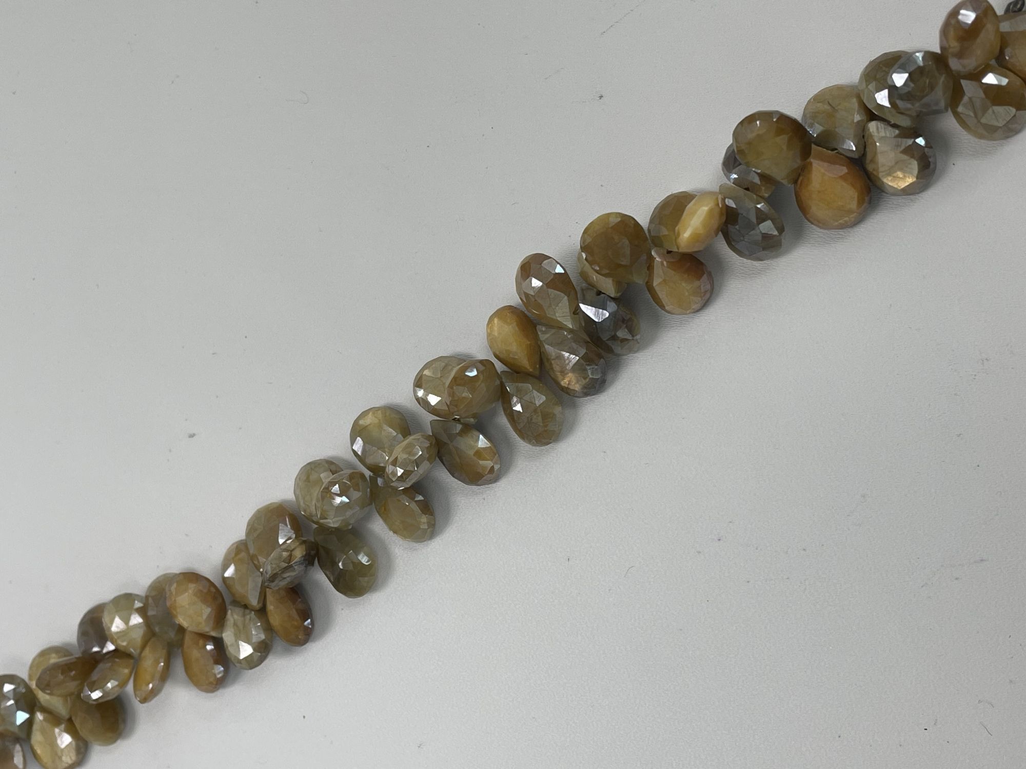 Coated Moonstone Pear Faceted