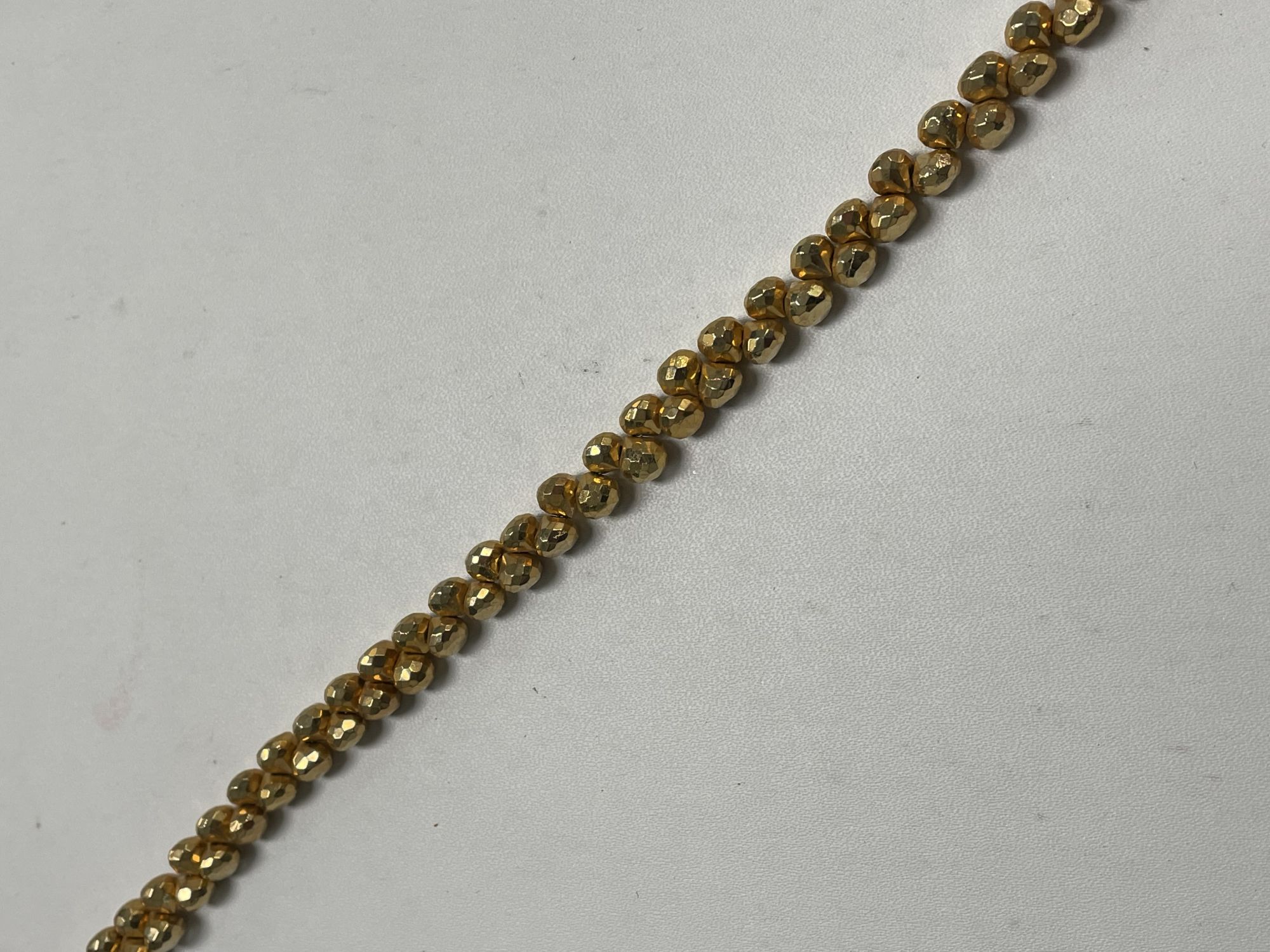 Golden Pyrite Onion Faceted