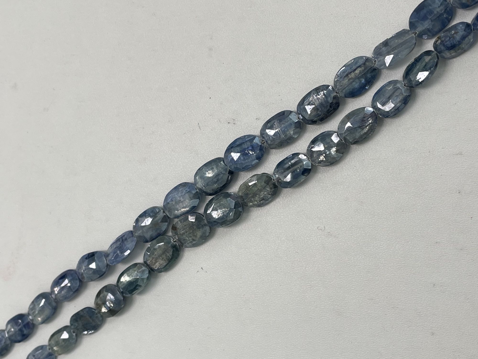 Coated Blue Kyanite Oval Faceted