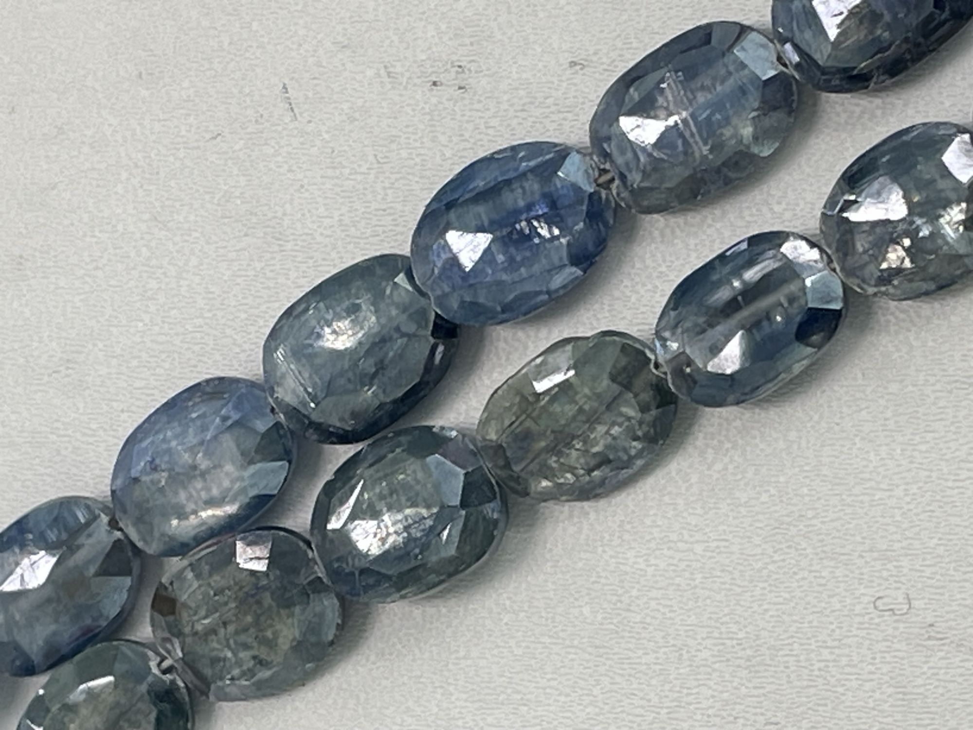 Coated Blue Kyanite Oval Faceted