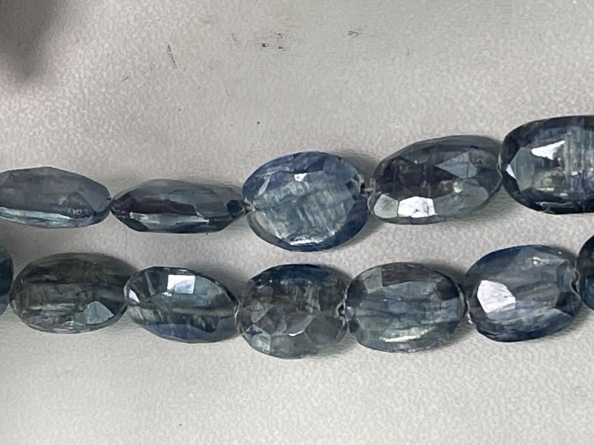 Coated Blue Kyanite Oval Faceted