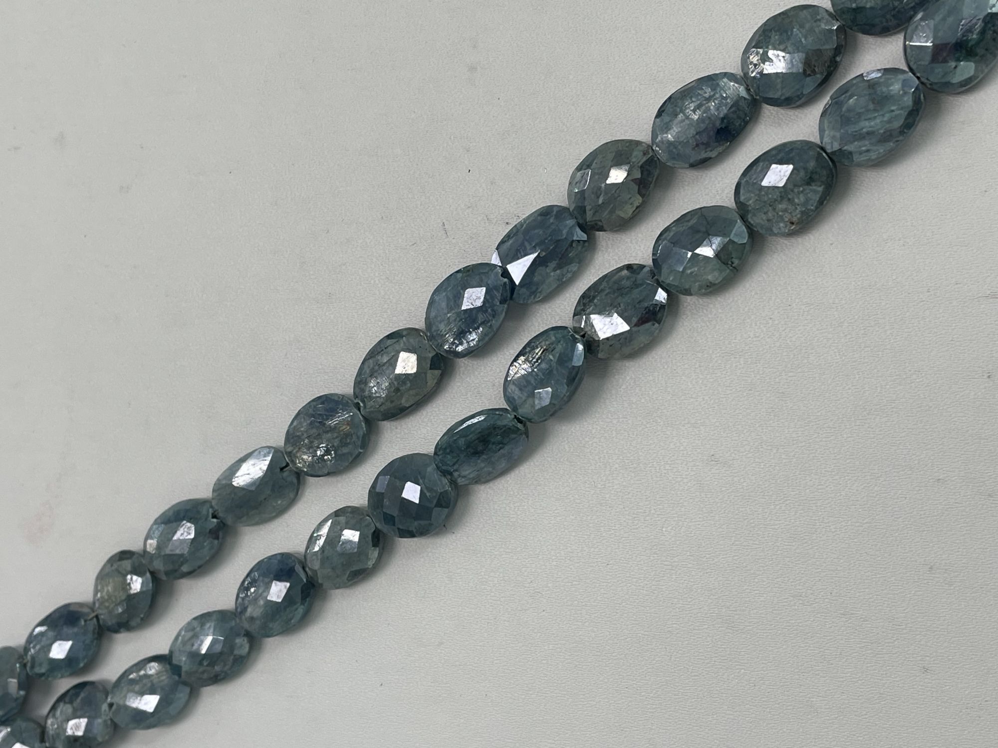 Coated Blue Kyanite Oval Faceted
