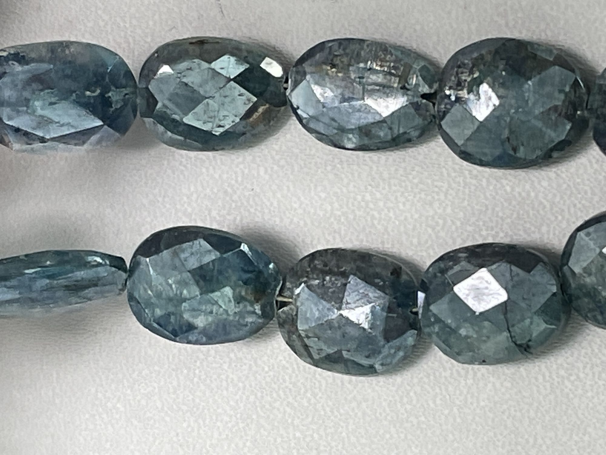 Coated Blue Kyanite Oval Faceted