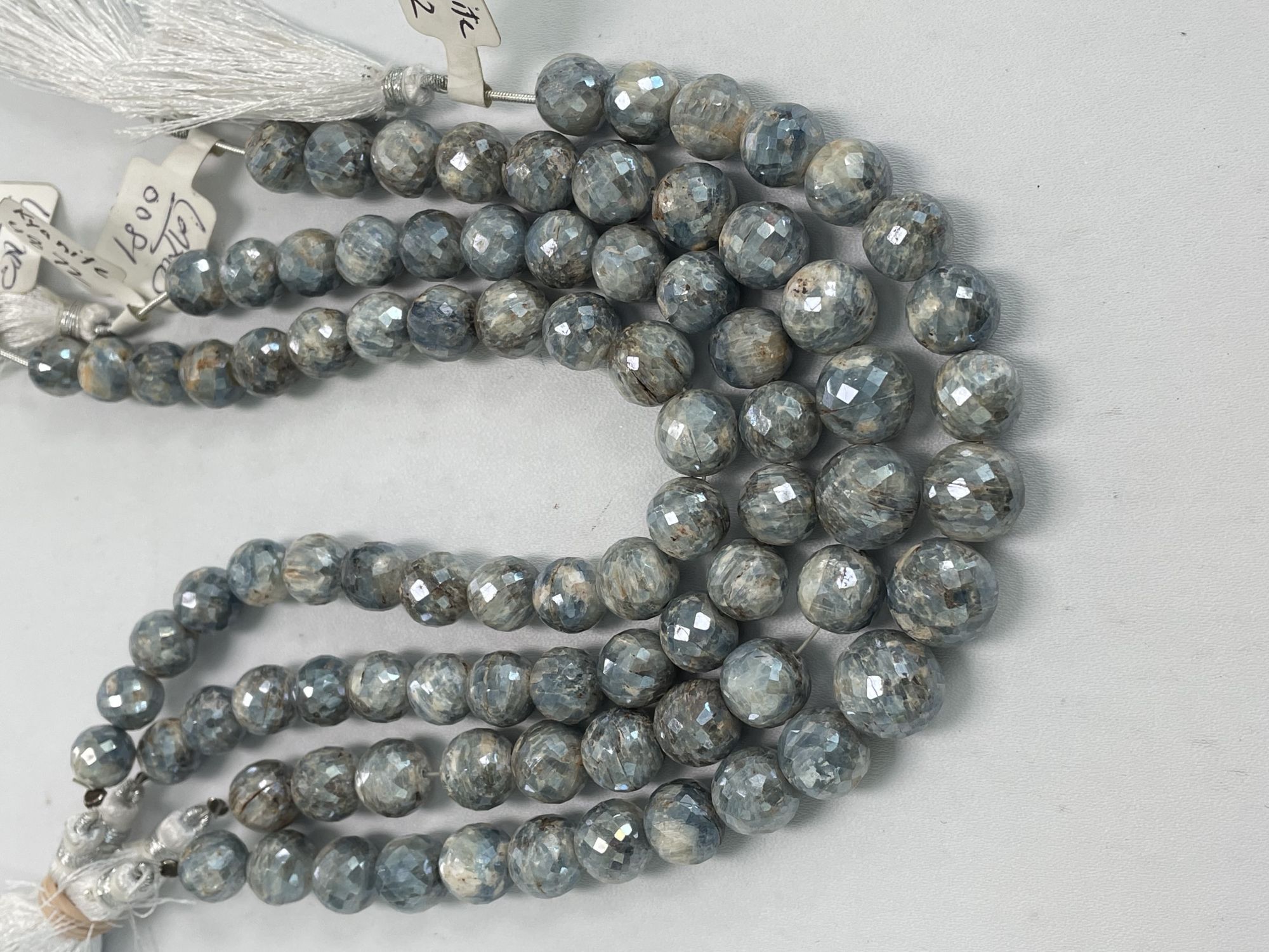 Coated Blue Kyanite Round Faceted