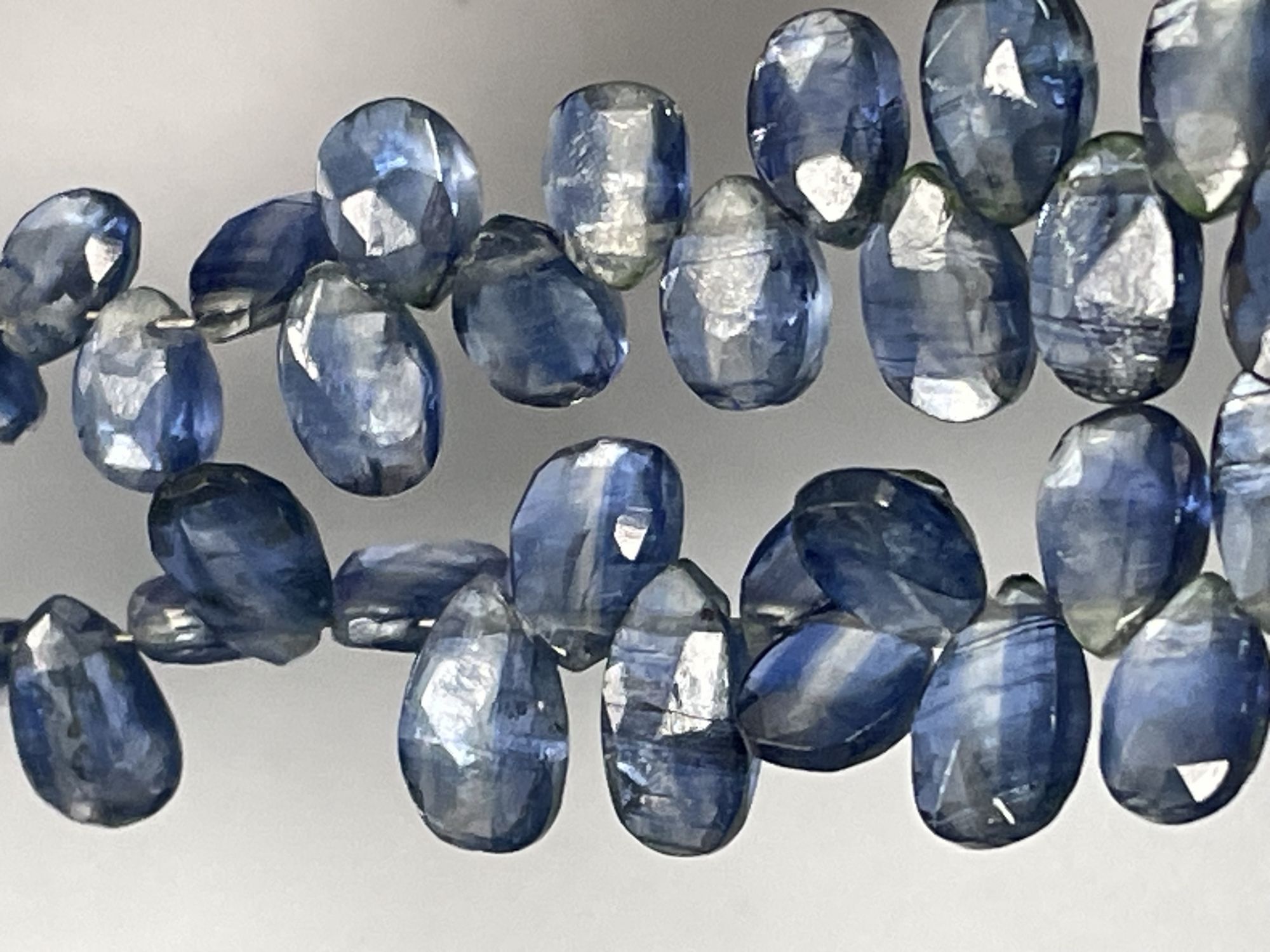 Coated Blue Kyanite Pear Faceted