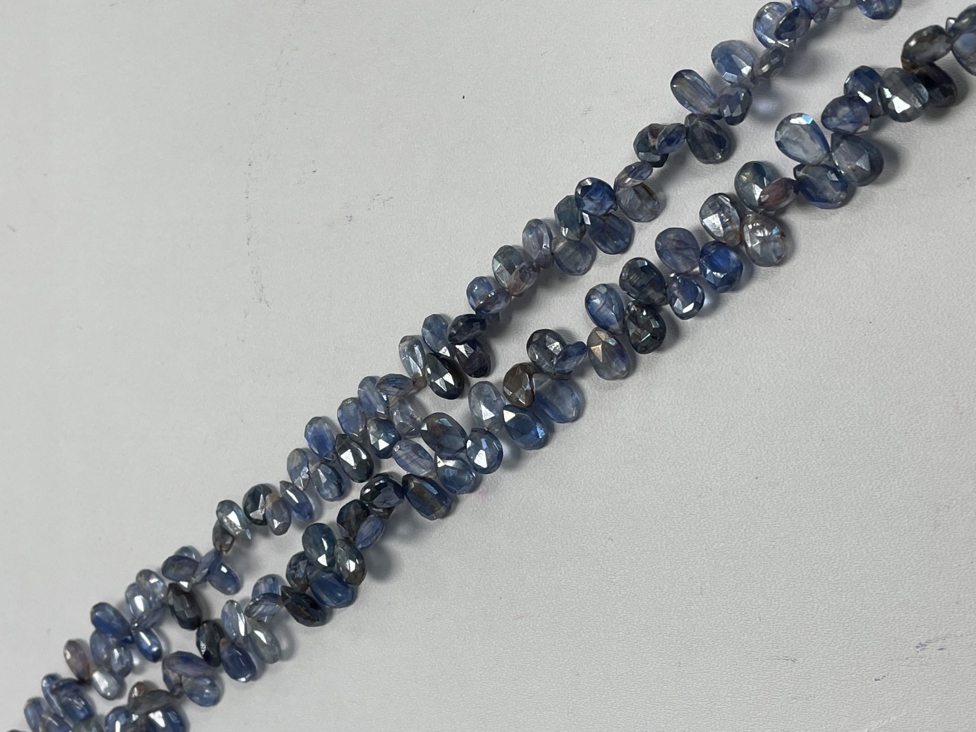 Coated Blue Kyanite Pear Faceted