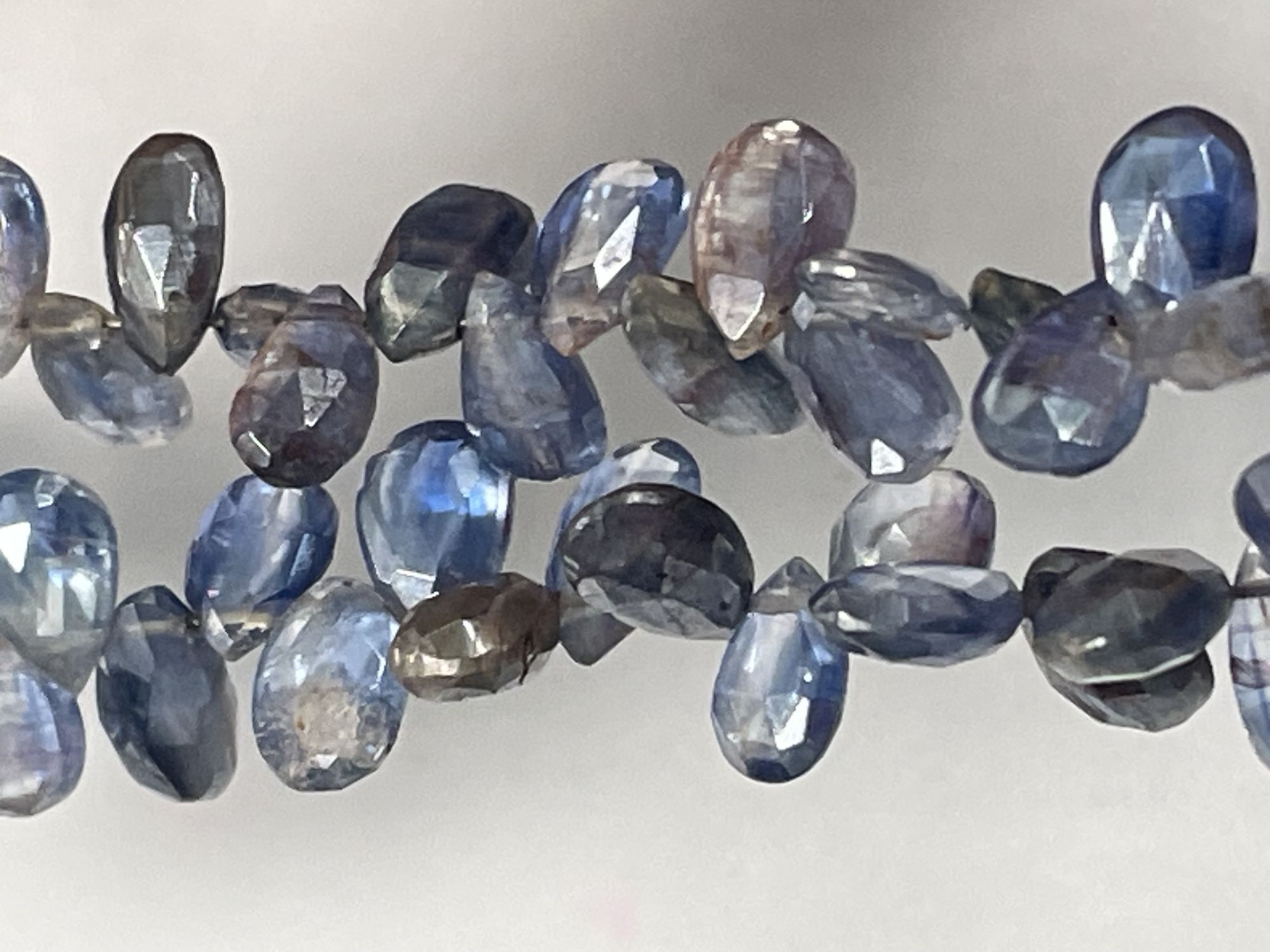 Coated Blue Kyanite Pear Faceted