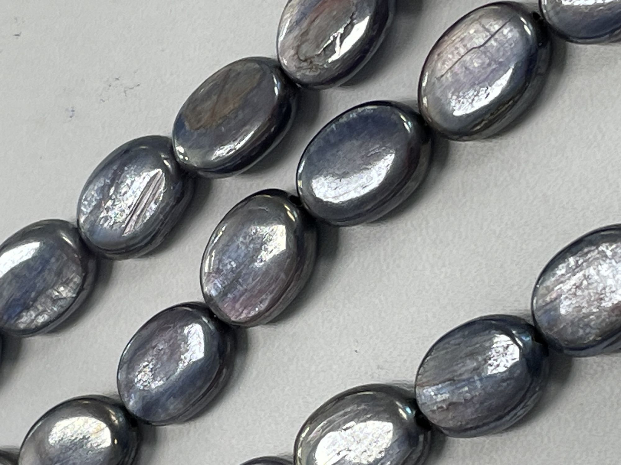 Coated Pink Blue Kyanite Oval Smooth