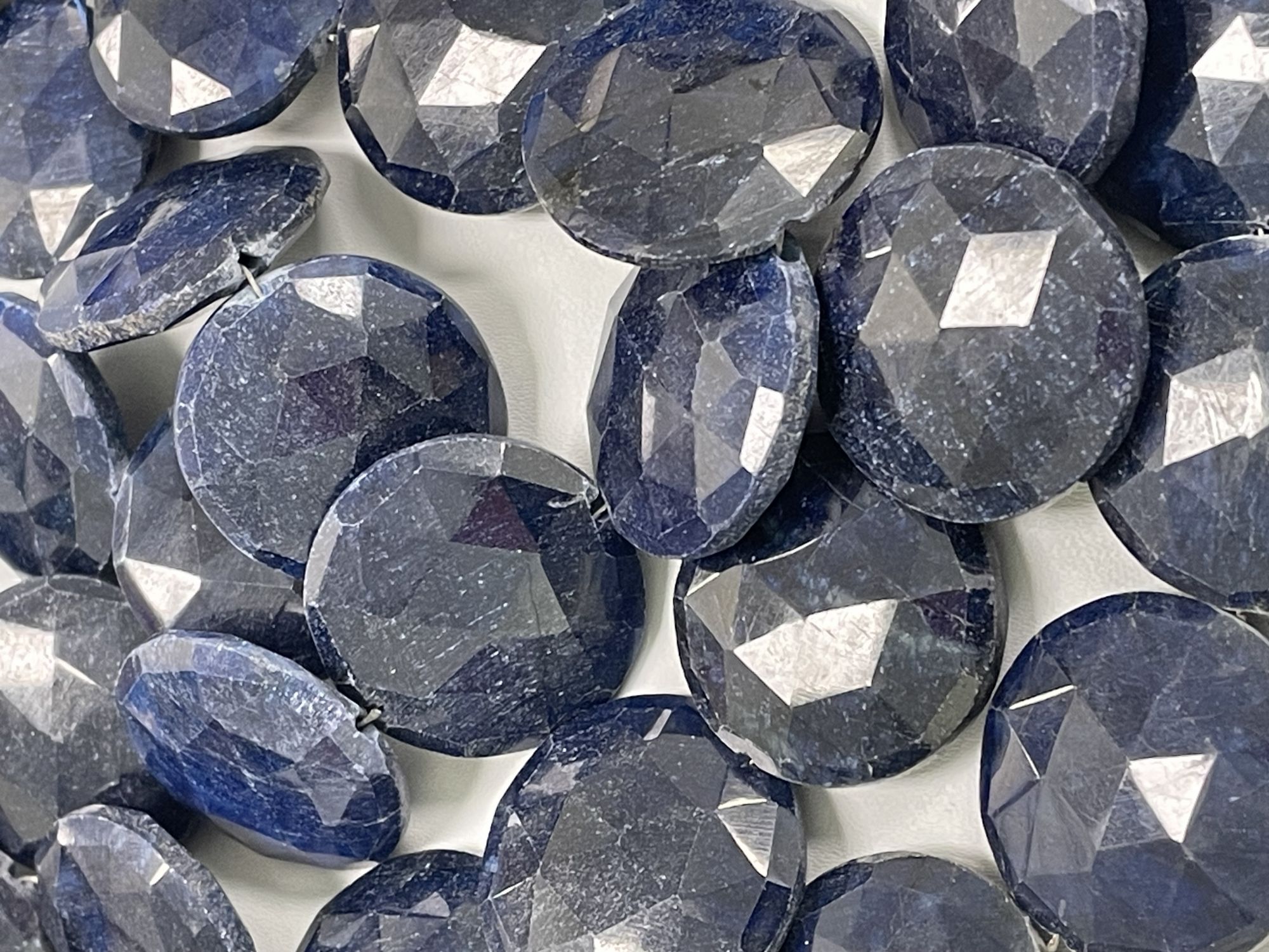 Oiled Blue Sapphire Coin Faceted